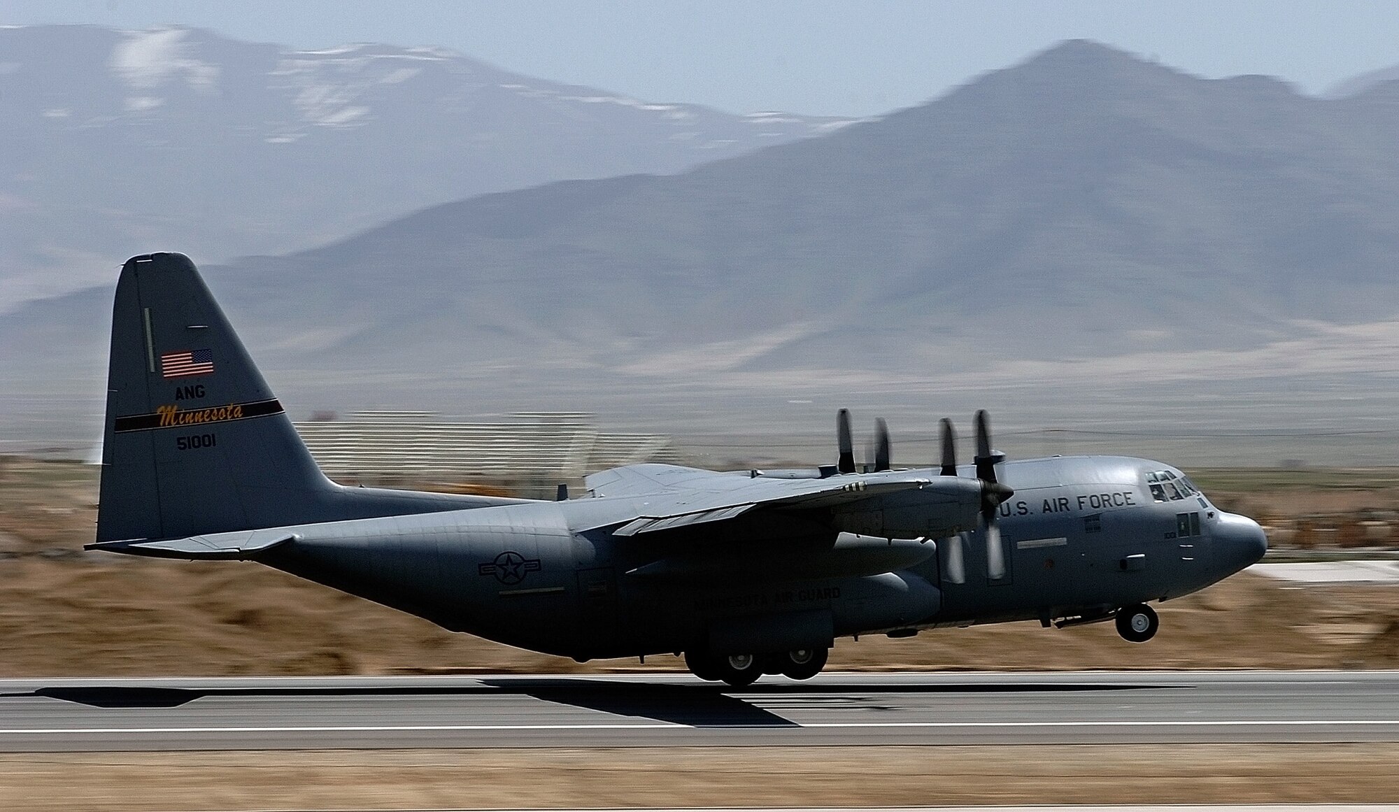 A C-130 Hercules takes off out of the Bagram Airfield flightline in support of Operation Enduring Freedom, March 27.  The C-130 North Carolina Air National Guard crew is providing critical supplies to replenish U.S. ground forces in Afghanistan. (U.S. Air Force photo/Chief Master Sgt. Mike Annis) 