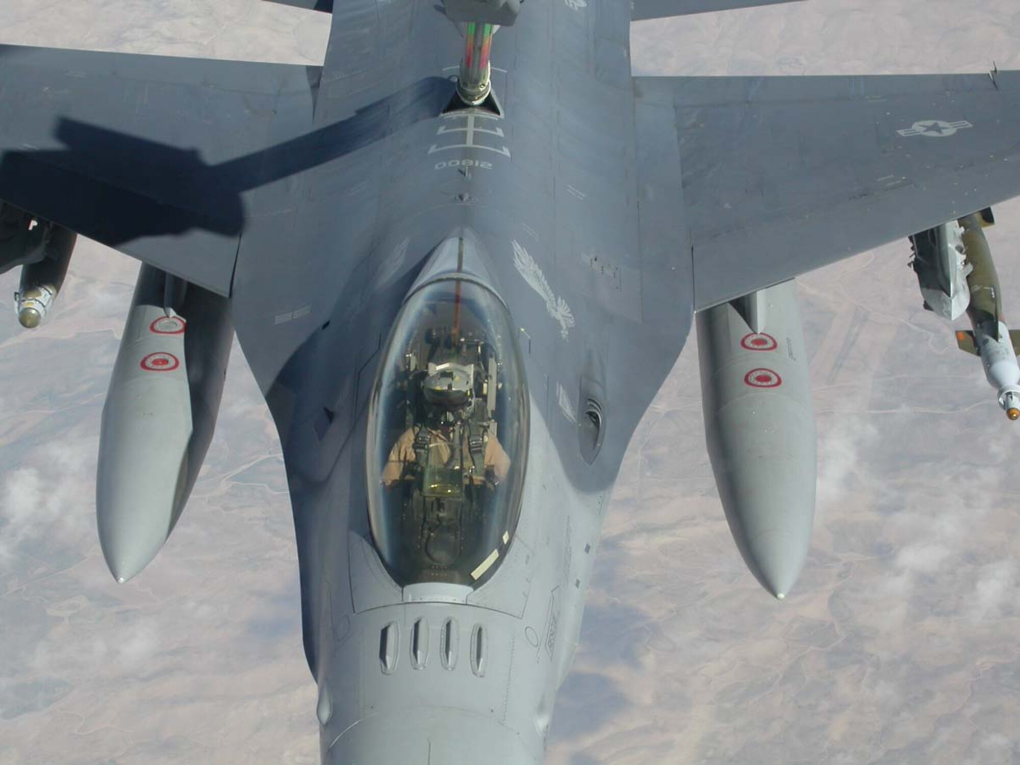 070412 -- SOUTHWEST ASIA --A Misawa F-16 Fighting Falcon from the 14th Expeditionary Fighter Squadron is photographed during a refuel in the area of responsibility in support of Operation Iraqi Freedom. (Courtesy photo)
