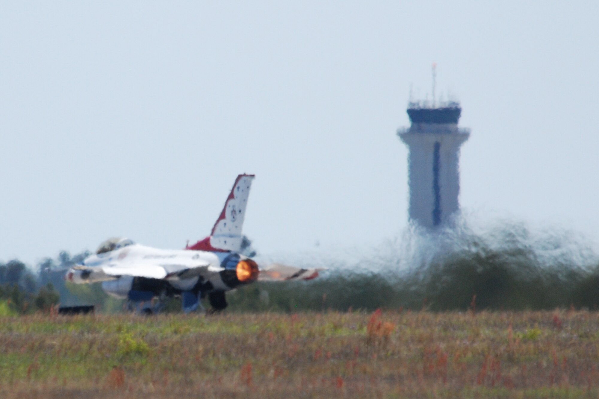 EGLIN AIR FORCE BASE, Fla. -- Under the watchful eye of Eglin's air traffic controllers, the U.S. Air Force Thunderbirds launch here April 14 in preparation for the practice session of the 2007 Eglin Air Show. The first day of the air show was cancelled for safety reasons due to a severe weather threat. The winds on the back side of the storm didn't keep spectators away April 15 as the Thunderbirds preformed in front of thousands of spectators to culminate the air show. (U.S. Air Force photo by Staff Sgt. Mike Meares)