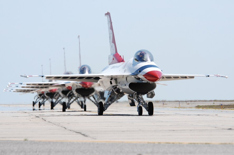 EGLIN AIR FORCE BASE, Fla. -- The U.S. Air Force Thunderbirds taxi down the runway here April 14 in preparation for the practice show. The first day of the air show was cancelled for safety reasons due to a severe weather threat. The winds on the back side of the storm didn't keep spectators away April 15 as the Thunderbirds preformed in front of thousands of spectators to culminate the air show. (U.S. Air Force photo by Staff Sgt. Mike Meares)