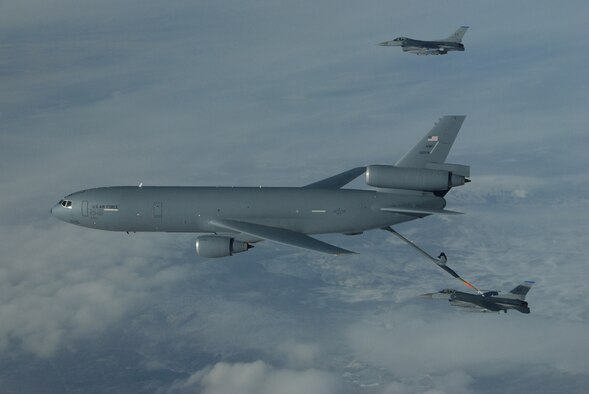 EIELSON AIR FORCE BASE, Alaska--Two F-16 Fighting Falcons from the 18th Fighter Squadron refuel behind a KC-10 Extender over the Pacific Alaska Range Complex during Red Flag-Alaska 07-1. Red Flag-Alaska is a Pacific Air Forces-directed field training exercise for U.S. forces flown under simulated air combat conditions. (U.S. Air Force photo by Master Sgt. Robert Wieland)