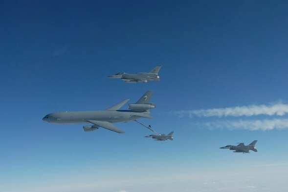EIELSON AIR FORCE BASE, Alaska--Three F-16 Fighting Falcons from the 18th Fighter Squadron refuel behind a KC-10 Extender over the Pacific Alaska Range Complex during Red Flag-Alaska 07-1. Red Flag-Alaska is a Pacific Air Forces-directed field training exercise for U.S. forces flown under simulated air combat conditions. (U.S. Air Force photo by Master Sgt. Robert Wieland)