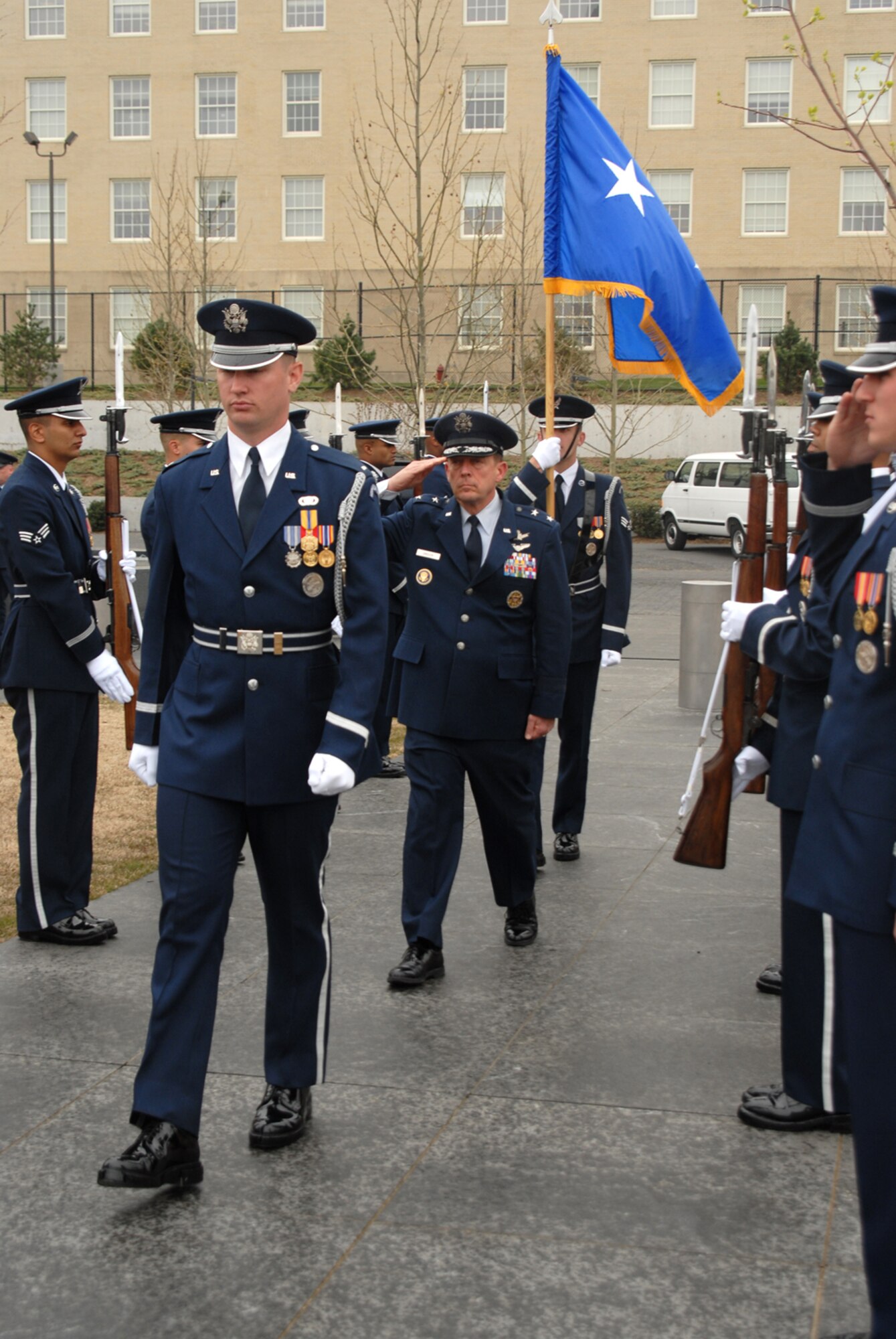 ARLINGTON, Va. -- First Lt. Brent Mundie, Air Force Honor Guard ceremonial guardsman, leads Maj. Gen. Robert Smolen, Air Force District of Washington commander, through the arrival cordon before beginning the Air Force Review ceremony held April 14 at the Air Force memorial.  