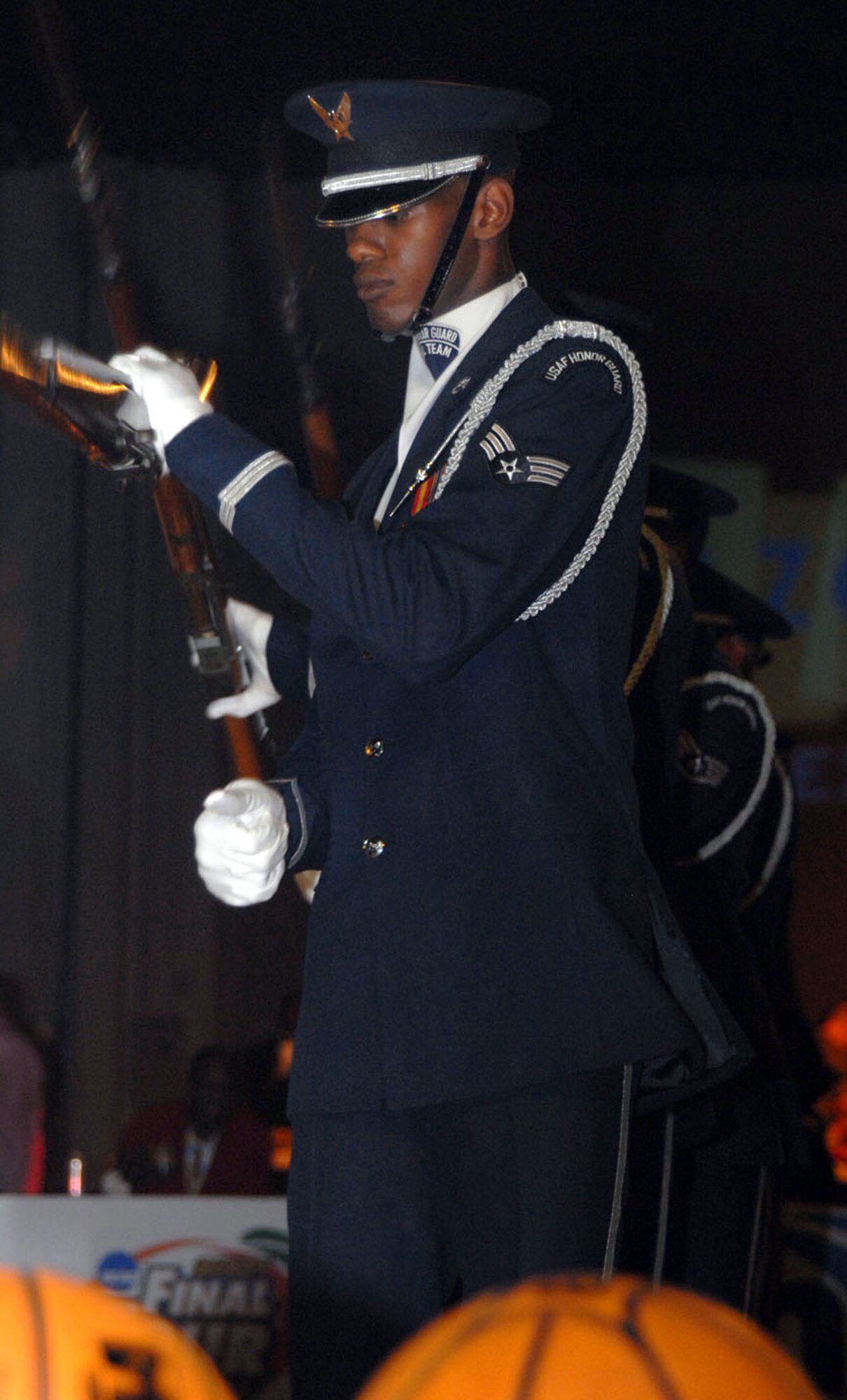 Senior Airman Jermaine James, Air Force Honor Guard Drill Team member, performs at the RazorGator experience for fans attending the NCAA Final Four Games March 31- April 2. The drill team recently returned from their latest 11-day tour around the U.S., that included visits to Atlanta; Hill Air Force Base, Utah; and Salt Lake City. (U.S. Air Force photo/Staff Sgt. Madelyn Waychoff)