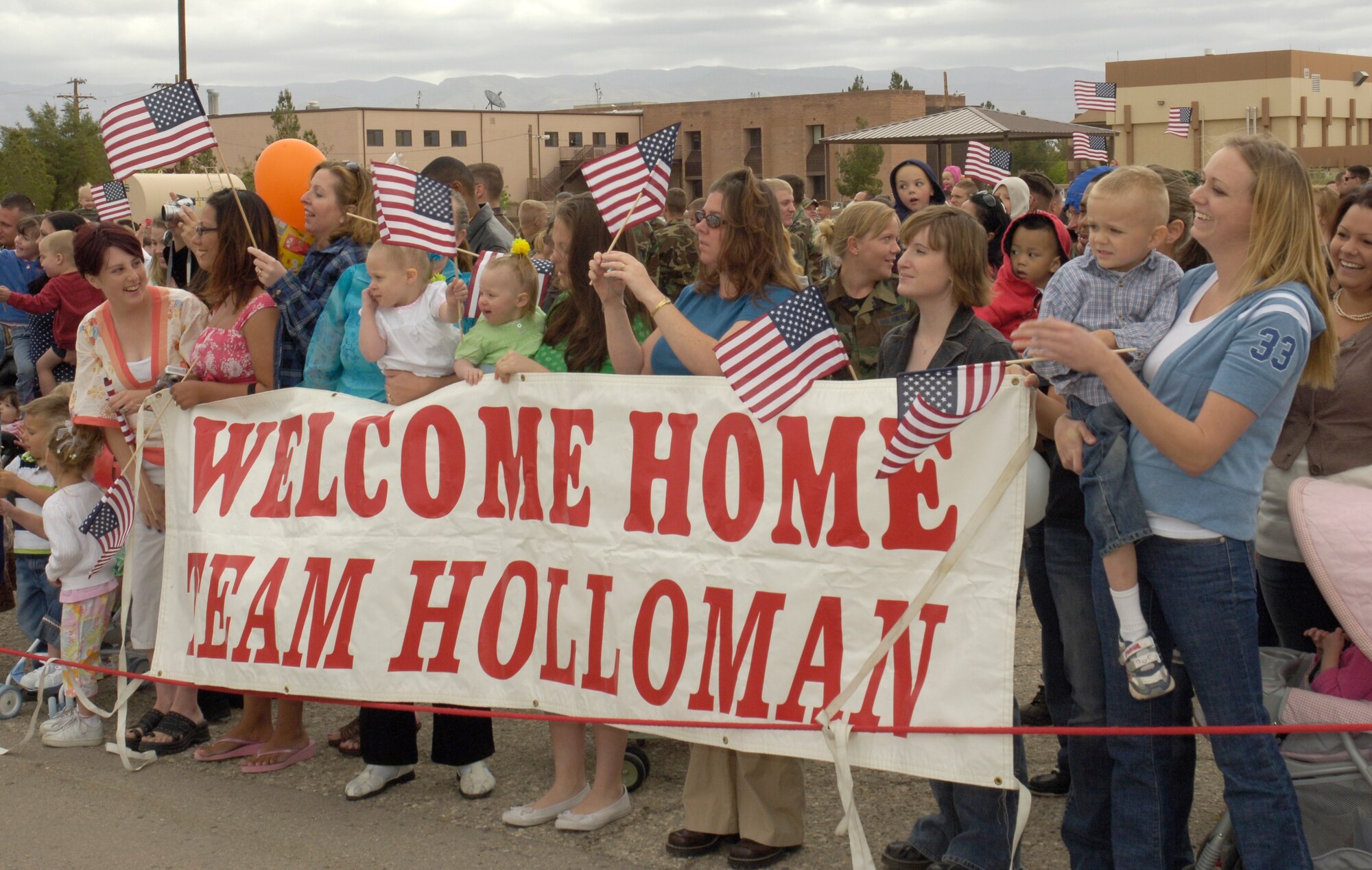 Family and friends wait at Holloman Air Force Base to greet loved ones who are returning home from a deployment at Kunsan Air Base, Republic of Korea April 13. (U.S. Air Force photo by Airman Michael Means)