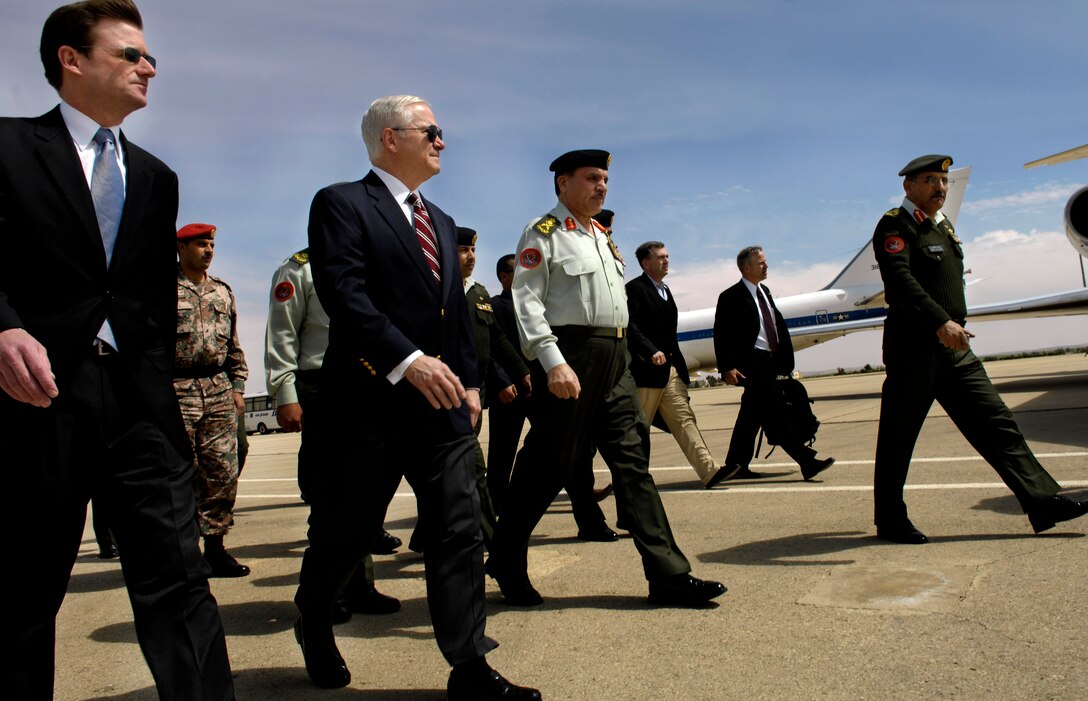 Defense Secretary Robert M. Gates walks with Jordanian General Khaled Jamil al-Sarayah, chairman of defense, and U.S. Ambassador to Jordan David Hale, left, upon his arrival in Amman, Jordan, April 16, 2007.  