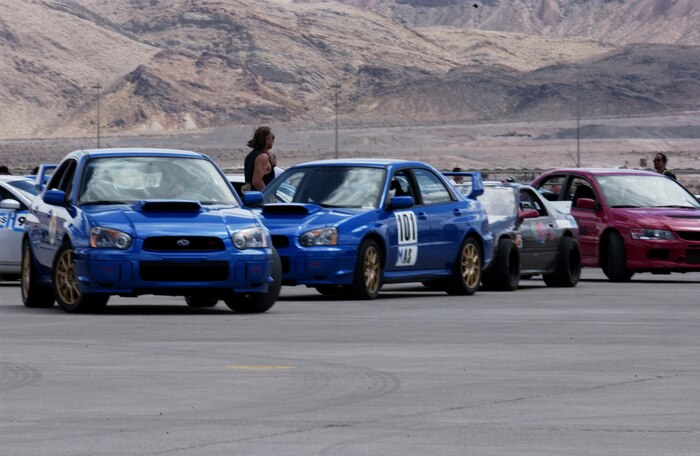 Autocross participants lineup for the Autocross race competition, held on the Nellis flightline. The event was sposored by the Las Vegas Sports Car Club of America and was designed to determine who has the car with the fastest time. (U.S. Air Force Photo/Senior Airman Larry Reid Jr.)