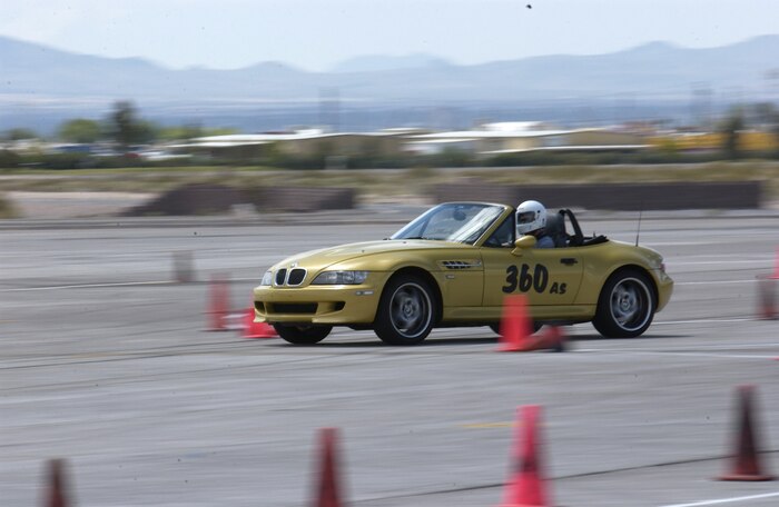 A participant driving a BMW Z3 goes through a sharp turn during the Autocross competition April 15, 2007 on Nellis Air Force Base, Nevada. The Autocross race competition, held on the Nellis flightline, was sposored by the Las Vegas Sports Car Club of America and was designed to determine who has the car with the fastest time. (U.S. Air Force Photo/Senior Airman Larry Reid Jr.)