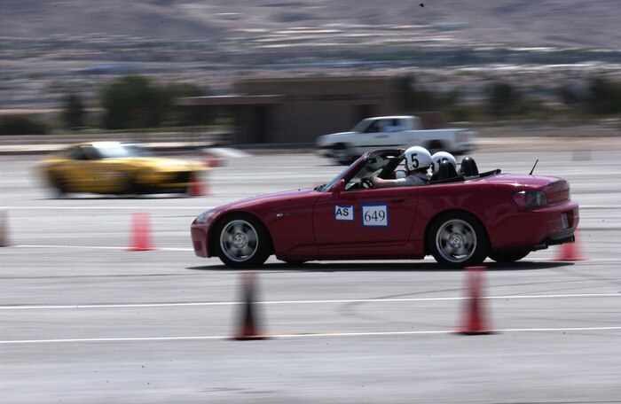 A participant driving a Honda S2000 goes through a sharp turn during the Autocross competition April 15, 2007 on Nellis Air Force Base, Nevada. The Autocross race competition, held on the Nellis flightline, was sposored by the Las Vegas Sports Car Club of America and was designed to determine who has the car with the fastest time. (U.S. Air Force Photo/Senior Airman Larry Reid Jr.)