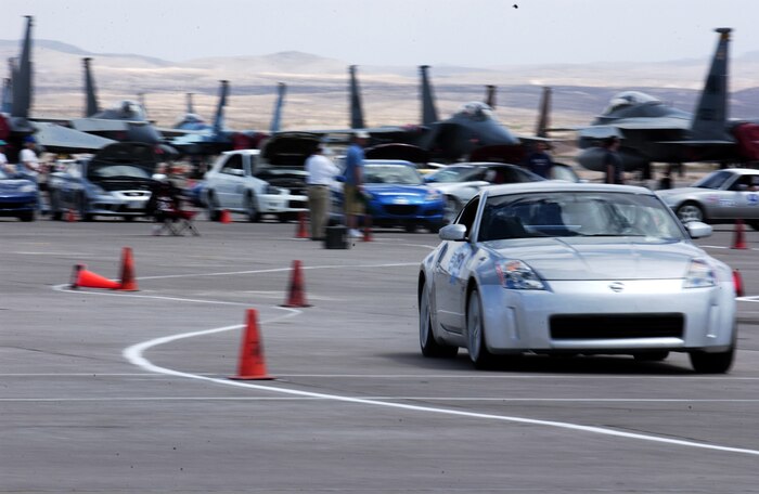 A participant taking off from the starting point driving a Nissan 350Z, prepares to go through the race course during the Autocross competition April 15, 2007 on Nellis Air Force Base, Nevada. The Autocross race competition, held on the Nellis flightline, was sposored by the Las Vegas Sports Car Club of America and was designed to determine who has the car with the fastest time. (U.S. Air Force Photo/Senior Airman Larry Reid Jr.)