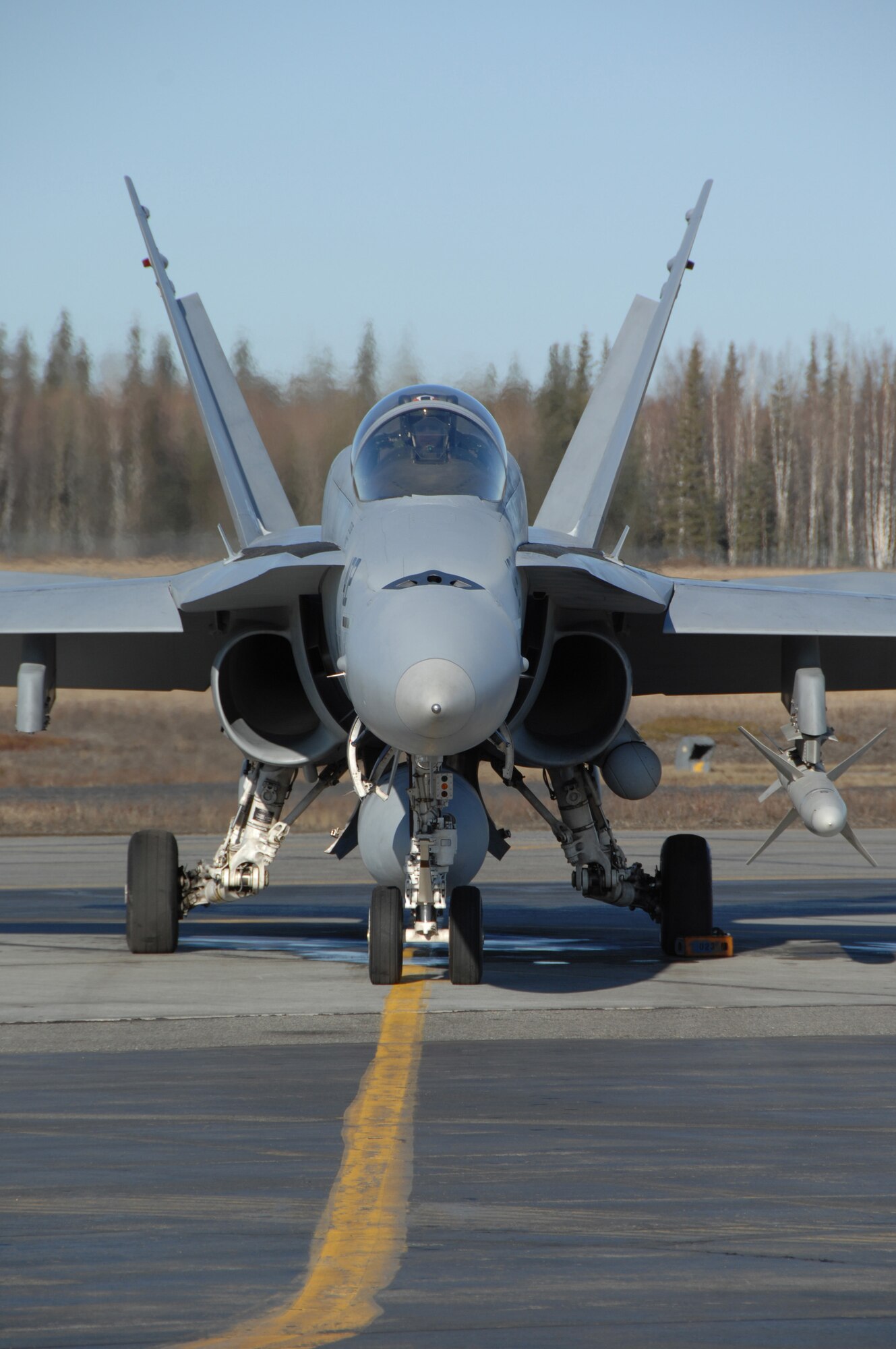 EIELSON AIR FORCE BASE, Alaska -- A Navy F/A-18 from Strike Fighter Squadron Eight Seven (VFA-87) sits on the flightline here during Red Flag-Alaska 07-1 here on April 12. VFA-87 is home based at Naval Air Station Oceana, Virginia. Red Flag-Alaska is a Pacific Air Forces-directed field training exercise for U.S. forces flown under simulated air combat conditions. It is conducted on the Pacific Alaskan Range Complex with air operations flown out of Eielson and Elmendorf Air Force Bases. (U.S. Air Force Photo by Staff Sgt Joshua Strang)