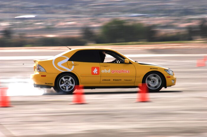 Ray Berlo, a drifting performer, conducts a practice drift on the flight line in preparation for the Autocross speed competition, April 14, 2007 on Nellis Air Force Base. (U.S AirForce Photo/Senior Airman Larry E. Reid Jr.)