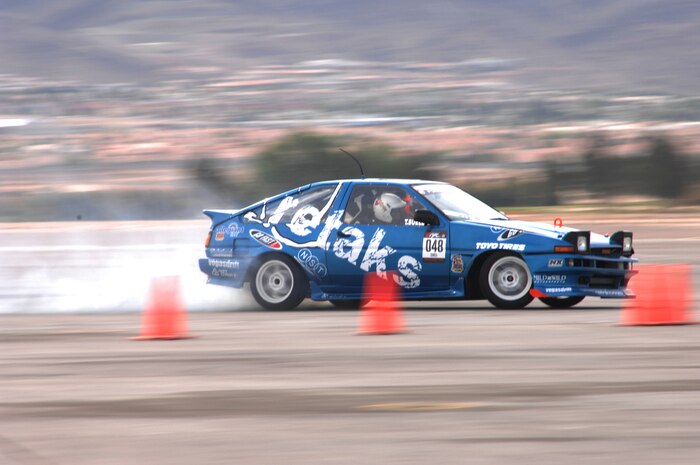 A drifter, conducts a practice drift on the flight line in preparation for the Autocross speed competition Saturday April 14, 2007 Nellis AFB, Nevada. (U.S AirForce Photo/Senior Airman Larry E. Reid Jr.)