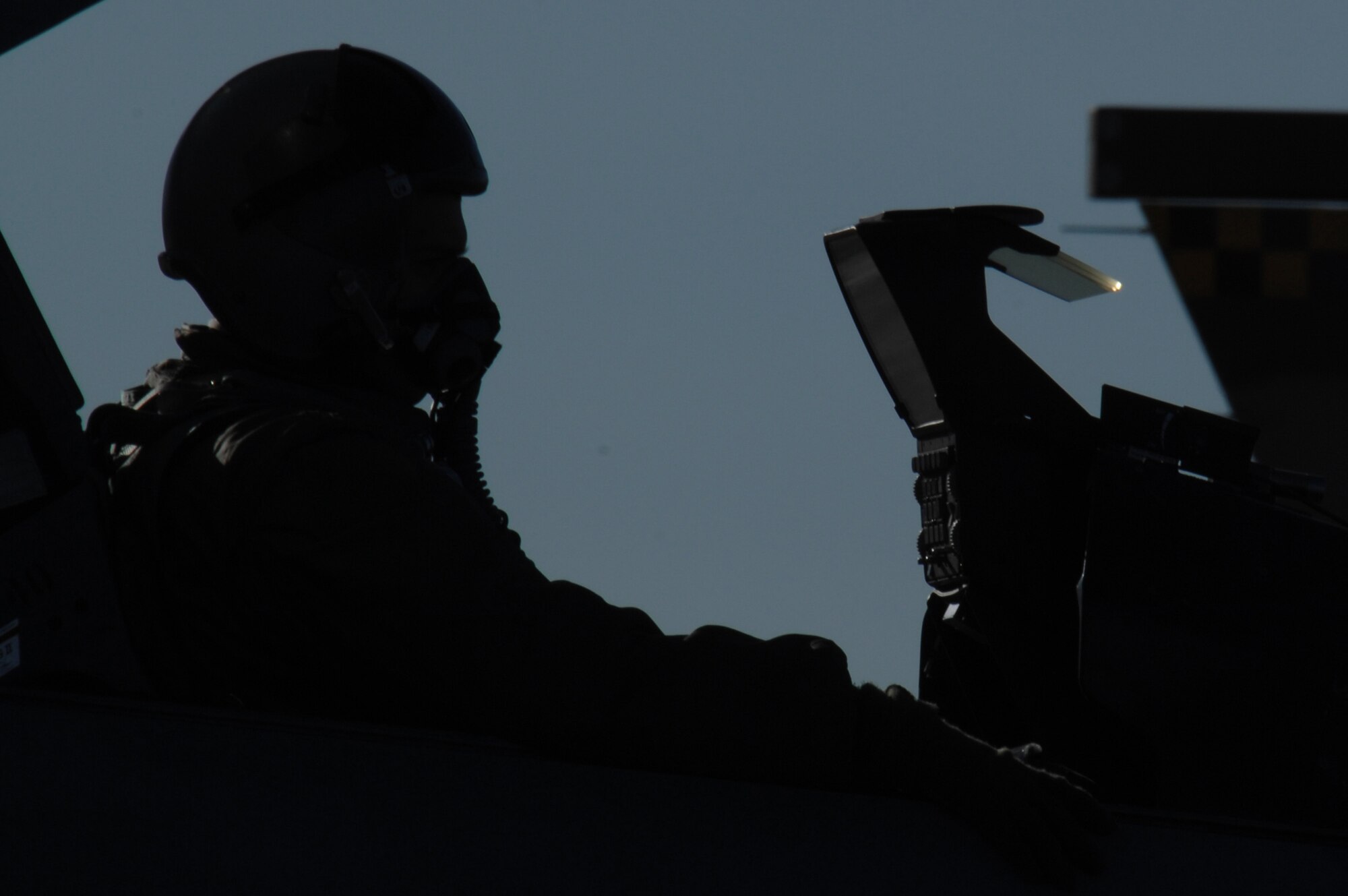 EIELSON AIR FORCE BASE, Alaska -- An F-16 Fighting Falcon pilot from the 64th Aggressor Squadron, Nellis Air Force Base, Nevada waits to taxi during Red Flag-Alaska 07-1. Red Flag-Alaska is a Pacific Air Forces-directed field training exercise for U.S. forces flown under simulated air combat conditions. It is conducted on the Pacific Alaskan Range Complex with air operations flown out of Eielson and Elmendorf Air Force Bases. (U.S. Air Force Photo by Staff Sgt Joshua Strang)