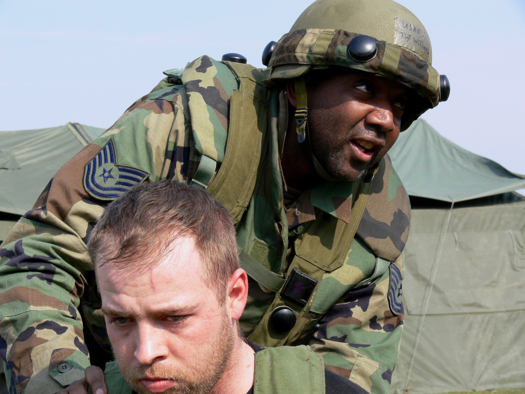 Tech. Sgt. Jamal Williams completes a search on an insurgent during a field training exercise in Bitburg, Germany. This exercise provides Airmen with hands-on experience before ever coming into contact with real-world scenarios. Sergeant Williams is a 1st CC meteorological navigational systems maintainer. (U.S. Air Force photo/Staff Sgt. Jeremy Hostetter)