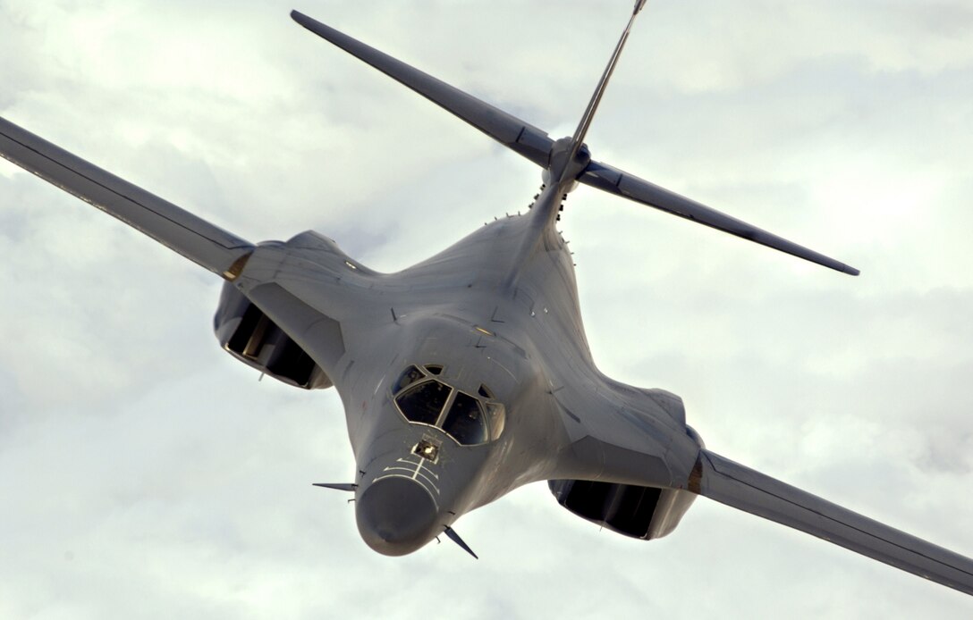 An Air Force B-1B Lancer flies a mission over Afghanistan. The B-1B can rapidly deliver massive quantities of precision and non-precision weapons against any adversary, anywhere in the world, at any time. (U.S. Air Force photo/Lance Cheung)