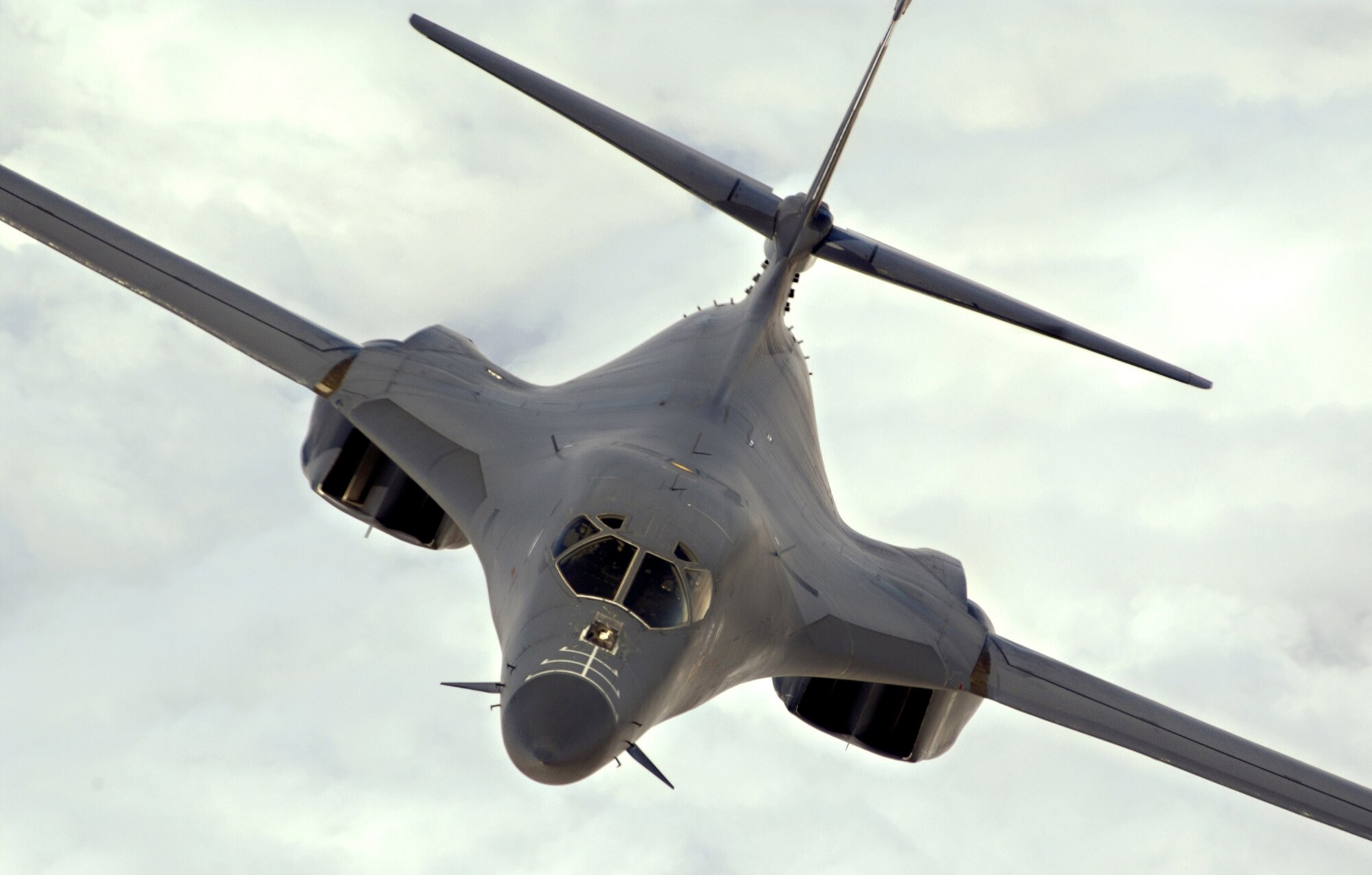 An Air Force B-1B Lancer flies a mission over Afghanistan. The B-1B can rapidly deliver massive quantities of precision and non-precision weapons against any adversary, anywhere in the world, at any time. (U.S. Air Force photo/Lance Cheung)