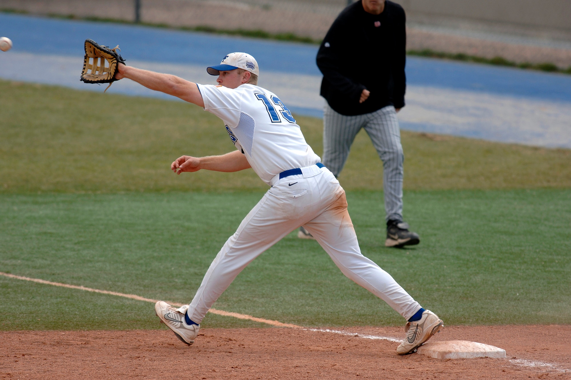 Senior first baseman Karl Bolt completes the infield play during the 17-8 loss to the New Mexico Lobos. New Mexico swept the 3-game series from the Air Force Falcons.   (U.S. Air Force photo/Mike Kaplan)