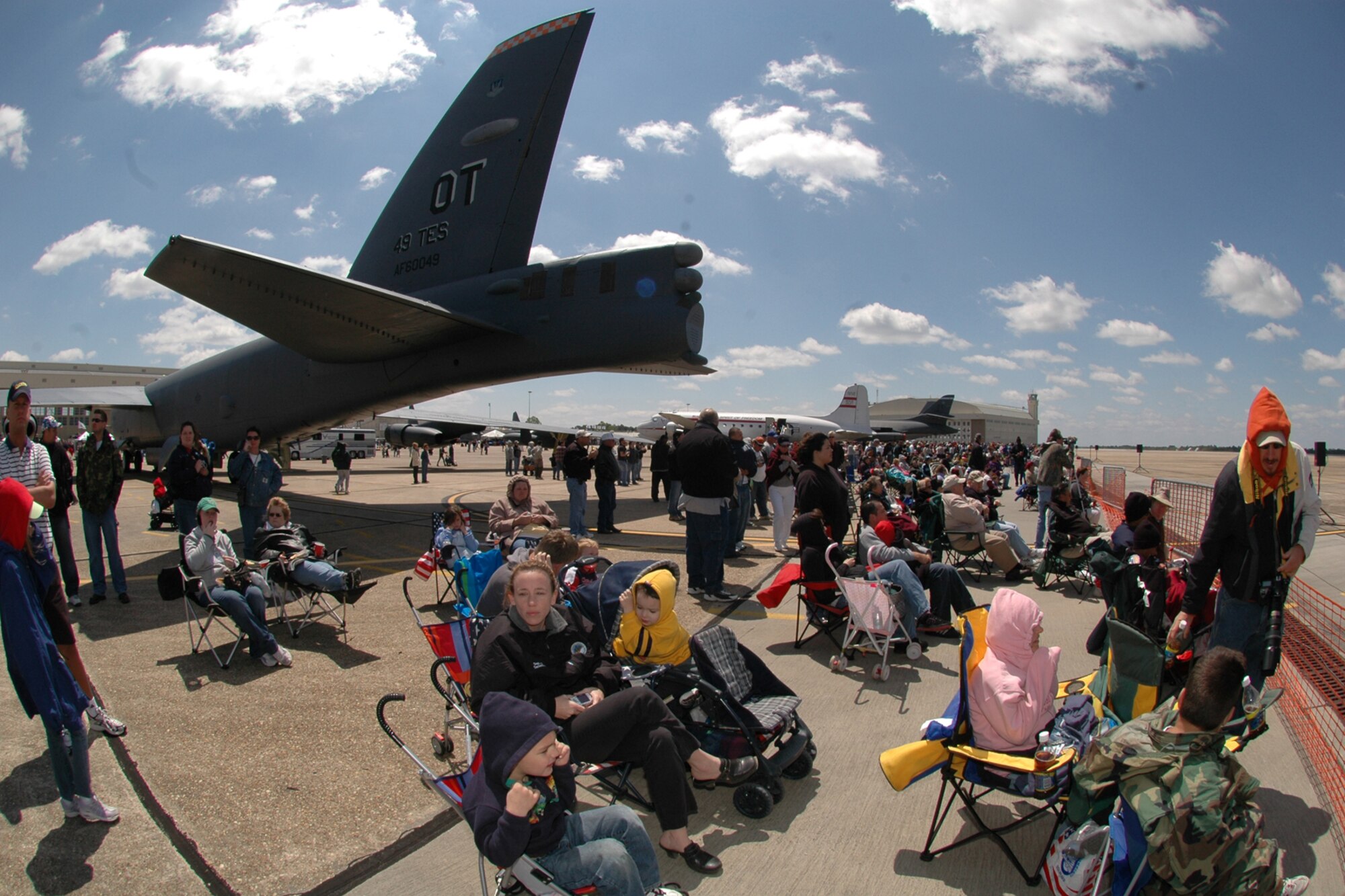EGLIN AIR FORCE BASE, Fla. -- Spectators gather along the flighline in preparation for the 2007 Eglin Air Show demonstrations to begin. The first day of the air show was cancelled due to severe weather coming into the area. Although the second day was cold and windy, thousands braved the elements to watch the aerial acrobatics in the skies over Eglin. (U.S. Air Force photo by Staff Sgt. Mike Meares)