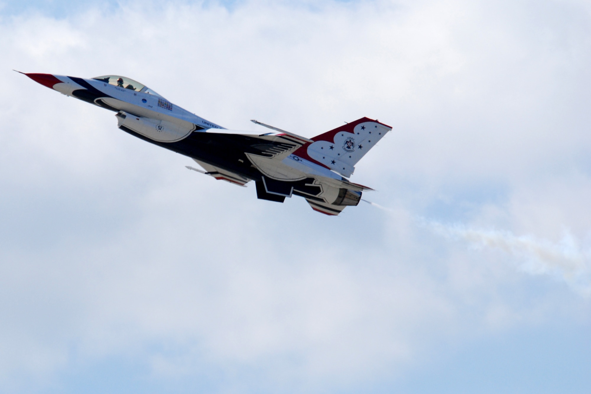 EGLIN AIR FORCE BASE, Fla. -- Maj. Ed Casey, U.S. Air Force Thunderbird number 5 lead solo pilot, performs a low and slow maneuver to demonstrate the capabilities of the F-16C Fighting Falcon -- also known as the Viper -- for more than 42,000 spectators at the 2007 Eglin Air Show April 15. The first day of the air show was cancelled for safety reasons due to a severe weather threat. The winds on the back side of the storm didn't keep spectators away April 15 as the Thunderbirds performance culminated the air show. The Thunderbirds are assigned to the U.S. Air Force Air Demonstration Squadron at Nellis Air Force Base, Nev. (U.S. Air Force photo by Staff Sgt. Mike Meares)