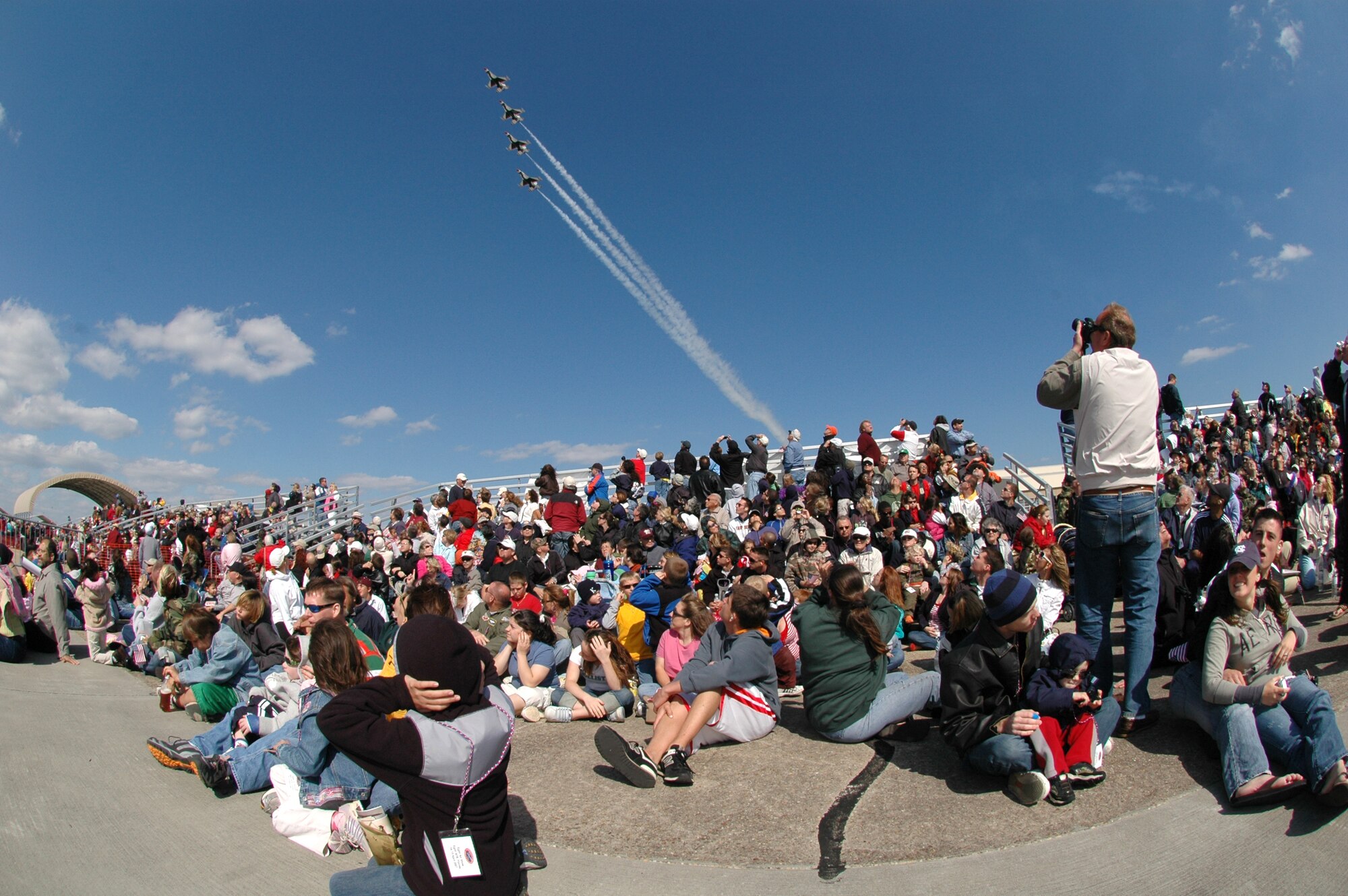 EGLIN AIR FORCE BASE, Fla. -- The U.S. Air Force Thunderbirds perform a precision maneuver during the 2007 Eglin Air Show April 15 to the surprise of the on-looking crowd. The first day of the air show was cancelled for safety reasons due to a severe weather threat. The winds on the back side of the storm didn't keep spectators away April 15 as the Thunderbirds preformed in front of more than 42,000 spectators to culminate the air show. (U.S. Air Force photo by Staff Sgt. Mike Meares)