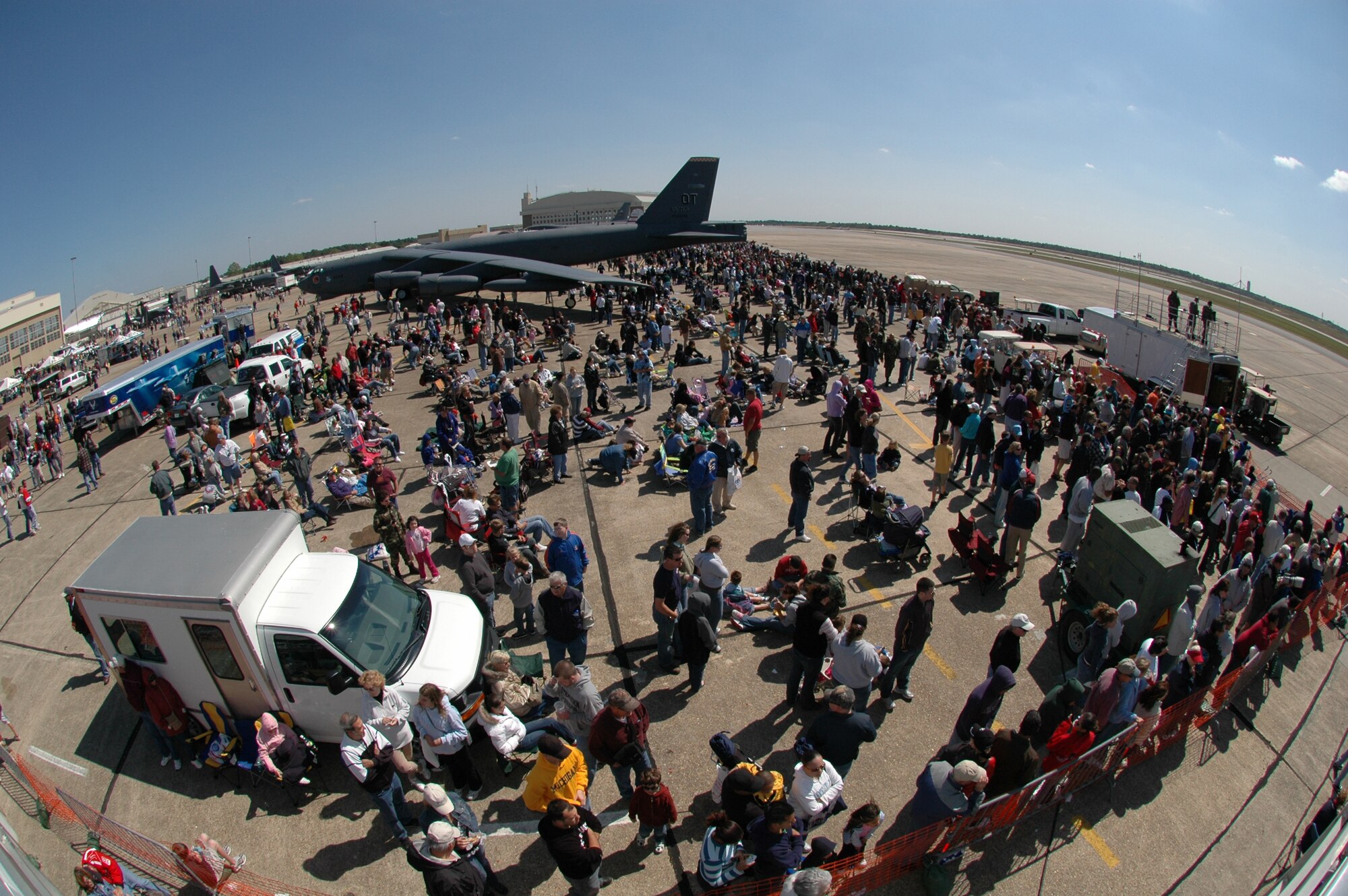 EGLIN AIR FORCE BASE, Fla. -- Spectators line the flight line and walk around the static displays like the B-52 bomber during the 2007 Eglin Air Show. The first day of the air show was cancelled for safety reasons due to a severe weather threat. The winds on the back side of the storm didn?t keep spectators away April 15 as the Thunderbirds preformed in front of more than 42,000 spectators to culminate the air show. (U.S. Air Force photo by Staff Sgt. Mike Meares)