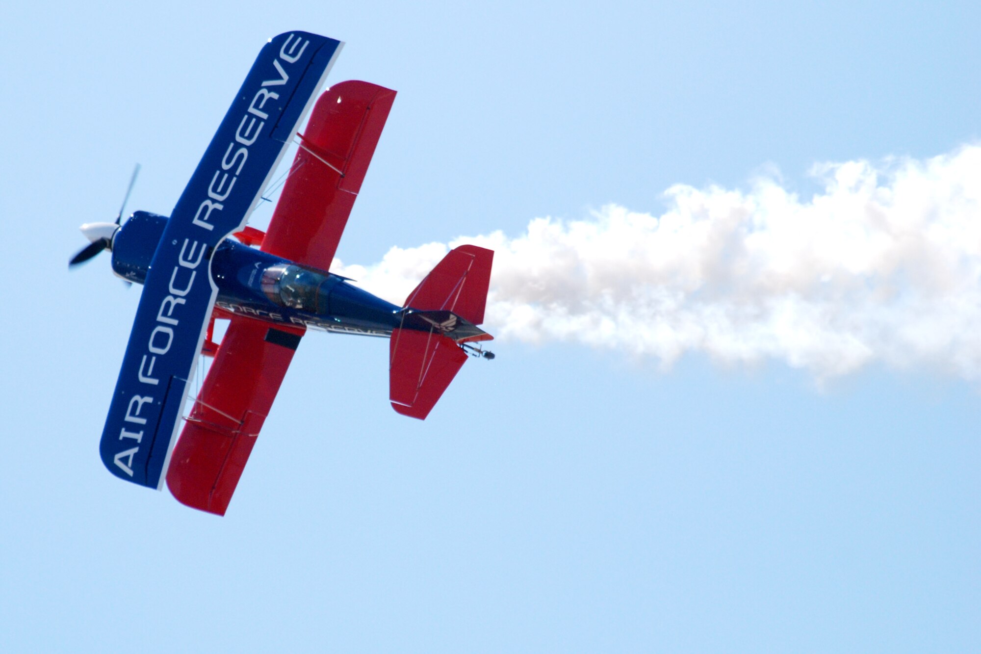 EGLIN AIR FORCE BASE, Fla. -- Ed Hamill, pilot of the Air Force Reserves Biplane, performs at the 2007 Eglin Air Show April 15. His aerial acrobatics, Living the Dream air show, dives and rolls through three acts: Barnstormers, Competitors and Skydancers. The routine began with a tribute to the first flight at Kitty Hawk, N.C., and finished with a skydancing performance. More than 42,000 were estimated to attend the air show April 15. (U.S. Air Force photo by Staff Sgt. Mike Meares)