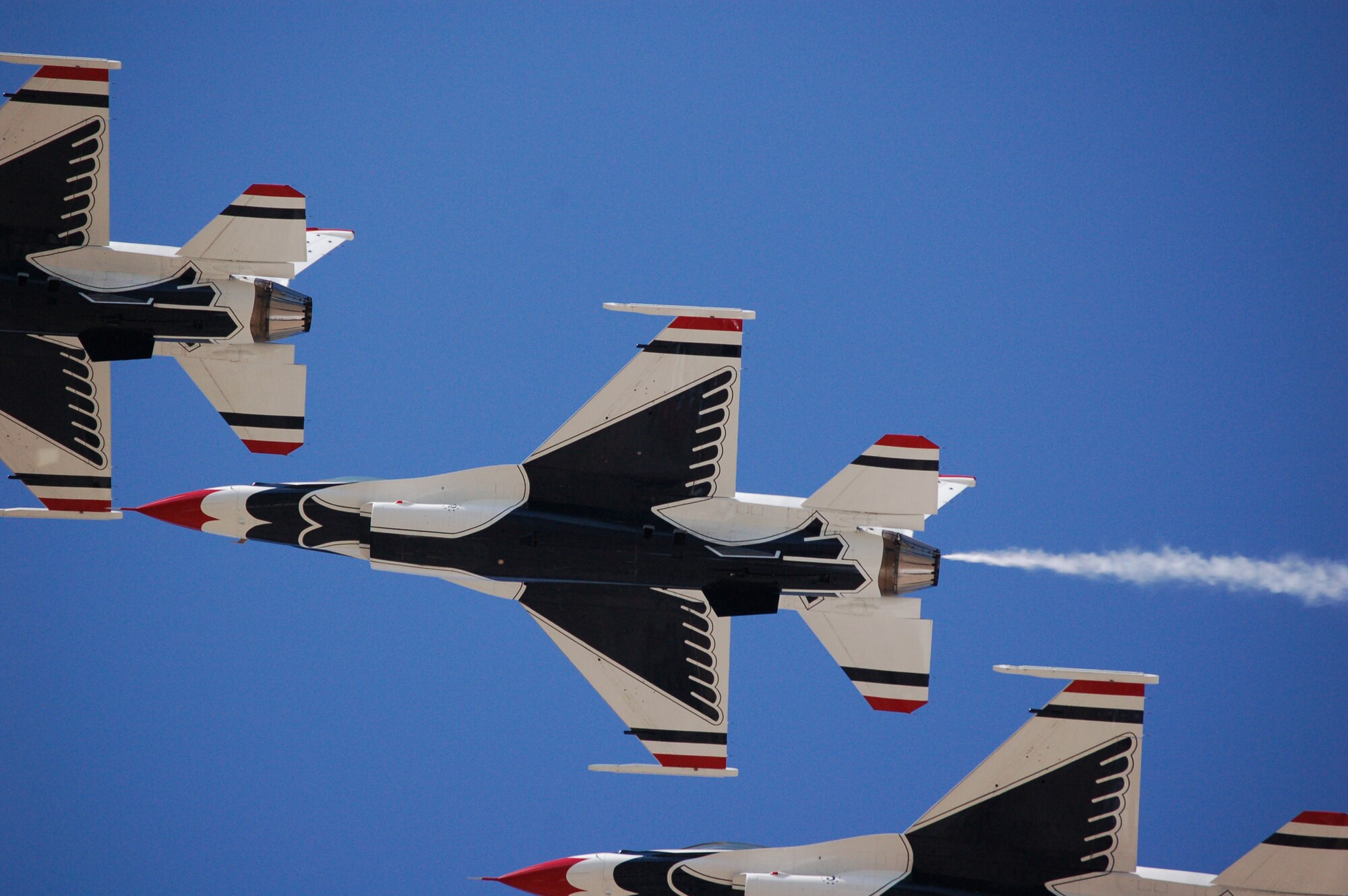 EGLIN AIR FORCE BASE, Fla. -- The U.S. Air Force Thunderbirds flight demonstration team flies in trail formation during the 2007 Eglin Air Show here April 15. The Thunderbirds are assigned to the U.S. Air Force Air Demonstration Squadron at Nellis Air Force Base, Nev. The first day of the air show was cancelled for safety reasons due to a severe weather threat. More than 42,000 people were in attendance April 15. (U.S. Air Force photo by Stephanie Meares)
