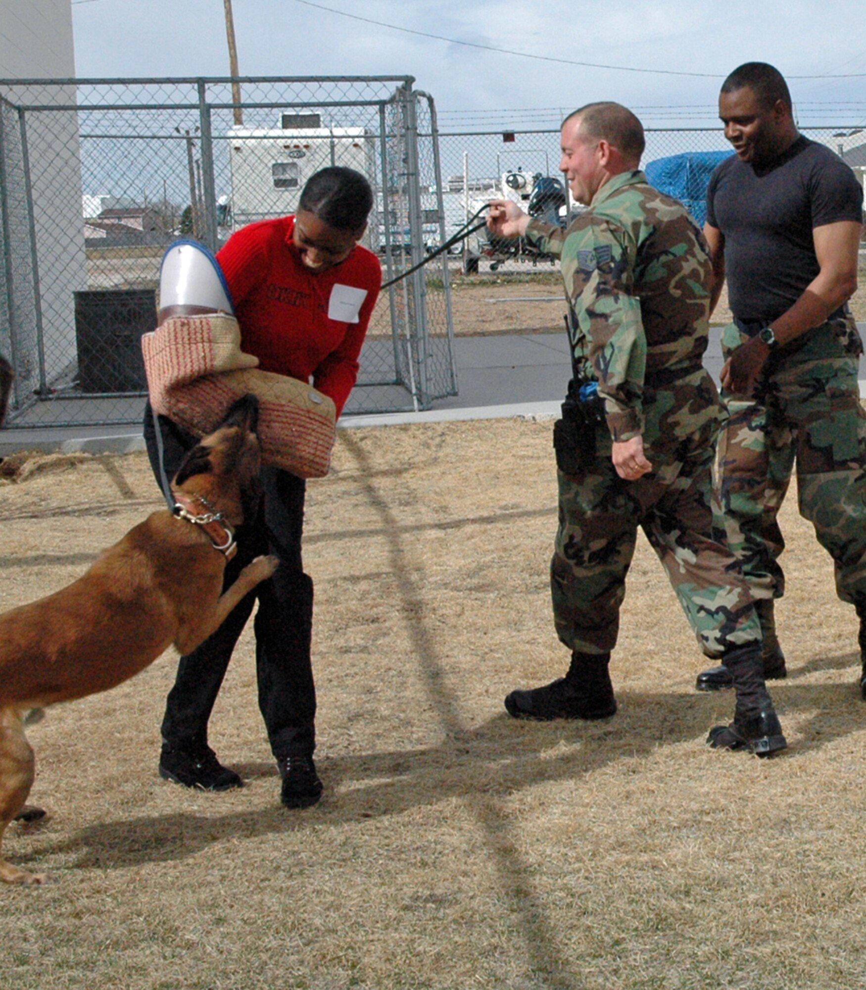 Sharon Francois, 90th Medical Group and wife of Senior Master Sgt. Bert Francois, 90th MSFS first sergeant, volunteers to be detained by Zak.