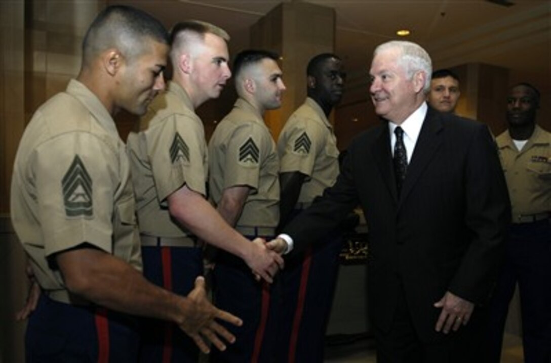 Secretary of Defense Robert M. Gates shakes hands with U.S. Marines attached to the U.S. Embassy in Amman, Jordan, on April 17, 2007.  Gates is in Jordan to meet with King Abdullah II to discuss key Middle East issues and how to further strengthen ties between the U.S. and Jordan.  