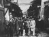 Chinese and American comrades at arms-Chinese soldiers bring in a group of General Doolittle’s Tokyo raiders to the tiny village near where their bomber crashed. Center right, his arm held by a Chinese is Col. John Hilger, who was injured. (National Archives, US Navy 80-G-063593).