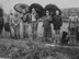 Doolittle raiders and Chinese soldiers with parasols; (National Archives, US Navy 80-G-063589).