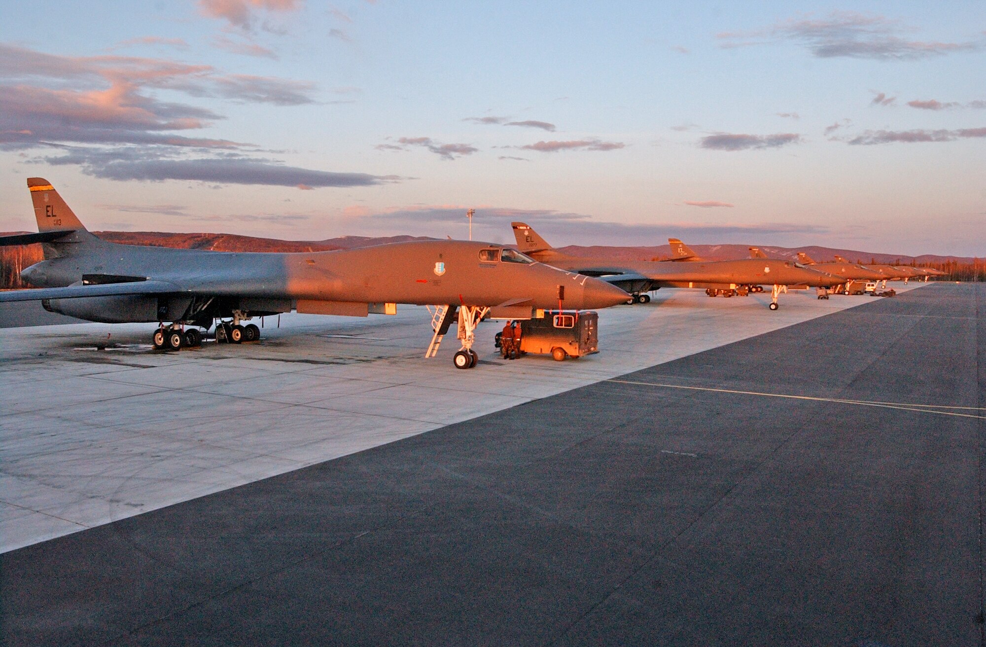 EIELSON AIR FORCE BASE, Alaska--The sun sets on a group of B-1B Lancers from Ellsworth Air Force Base, South Dakota during Red Flag-Alaska on April 16. VFA-87 is based at Naval Air Station Oceana, Virginia. More than 1,300 military members from the United States, France and Australia have gathered in the Last Frontier to participate in Red Flag-Alaska 07-1 scheduled from April 5 to 21. (U.S. Air Force photo by Senior Airman Justin Weaver).                   