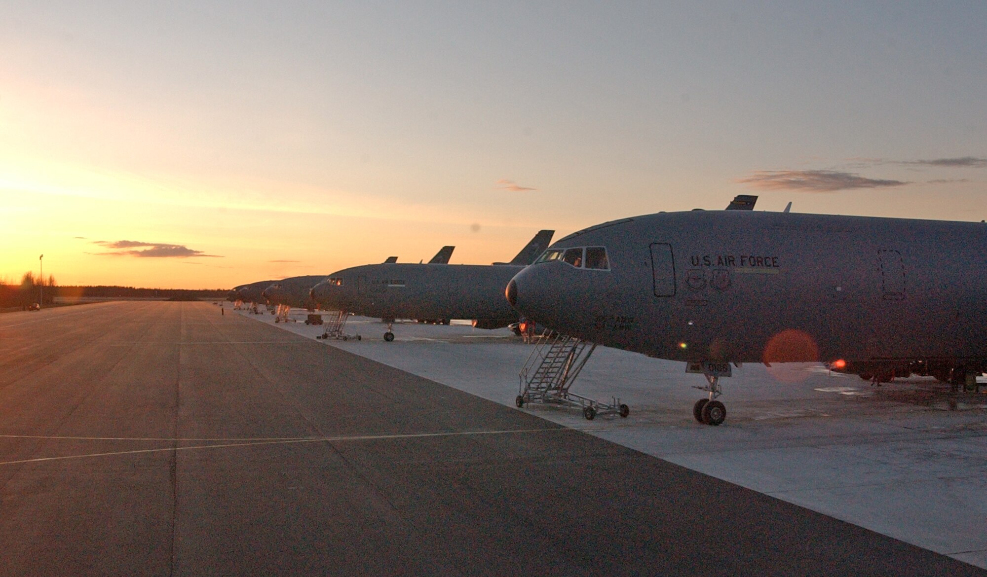 EIELSON AIR FORCE BASE, Alaska--The sun sets on a group of KC-10 Extenders during Red Flag-Alaska 07-1 here on April 16. More than 1,300 military members from the United States, France and Australia have gathered in the Last Frontier to participate in Red Flag-Alaska 07-1 scheduled from April 5 to 21. (U.S. Air Force photo by Senior Airman Justin Weaver).