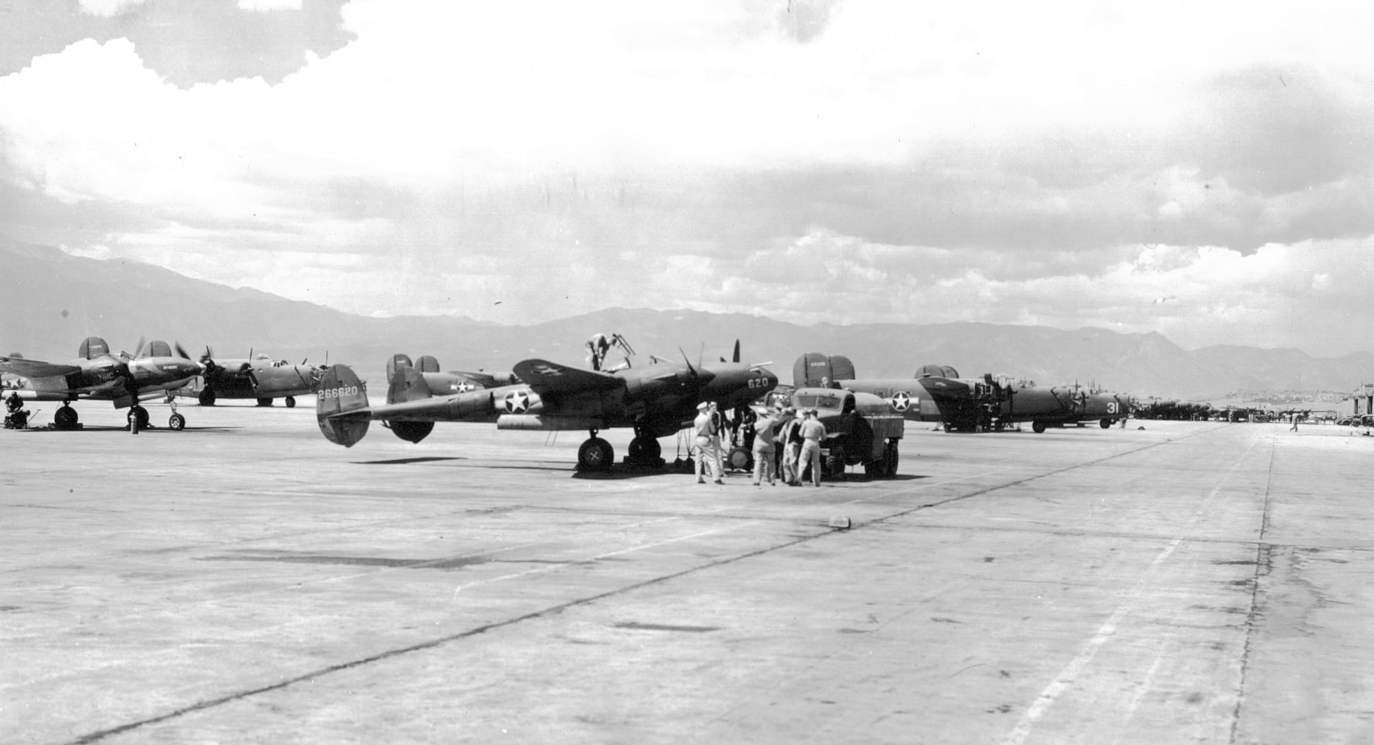 Aircraft crowd the Peterson Field flight line in 1943.  During World War II, Peterson served as a reconnaissance, bomber, and fighter training base. (U.S. Air Force photo)