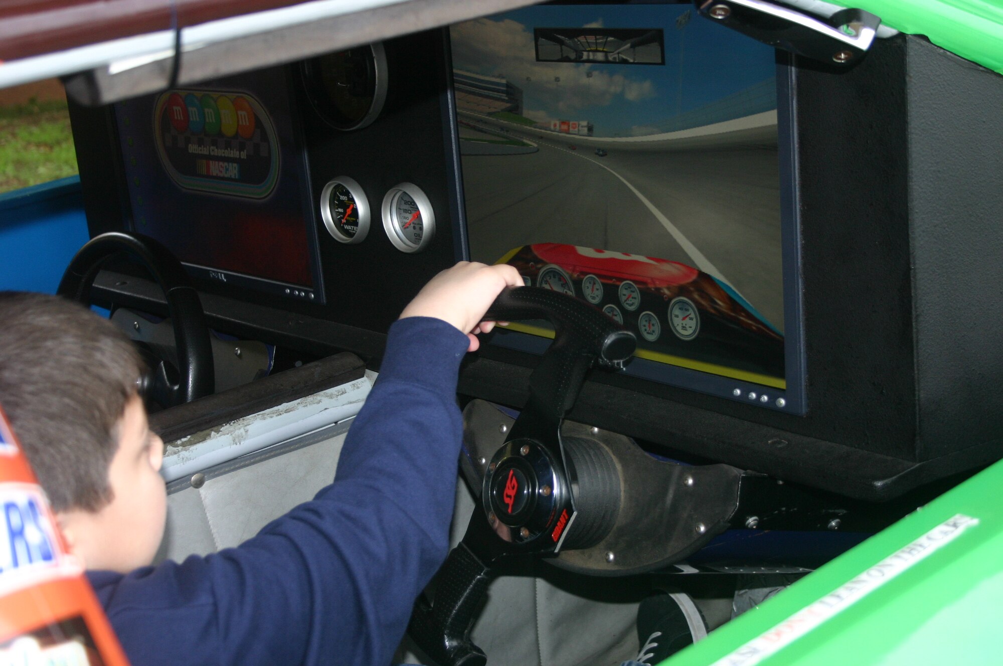 A computerized racing game has been installed, along with seats, into this former NASCAR racer.  The tour, sponsored by M&M/Mars, was scheduled to stop at Sheppard in conjuction with the Samsung 500 held April 15 at the Dallas Motor Speedway. (U.S. Air Force photo/Staff Sgt. Tonnette Thompson) 