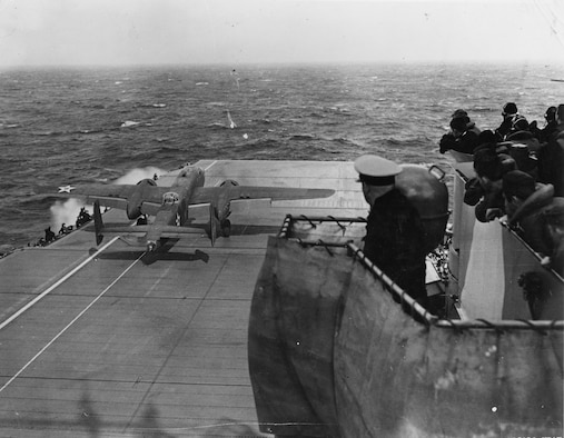 USS HORNET, PACIFIC OCEAN 1942 -- Lt. Col. James "Jimmy" Doolittle performs a full-throttle takeoff from the USS Hornet 650 miles from Japan on a secret mission. The Doolittle Raid, U.S. Army Air Force special order #1 of World War II, was a daring one-way mission of 16 B-25 Mitchell medium bombers with 80 aircrew, commanded by Colonel Doolittle, to carry out America's first offensive attack on Japan. The crews secretly trained for two-weeks and modified the B-25s at Eglin Air Force Base's Wagner Field, Auxiliary Field 1 prior to the mission. (Photo courtesy National Museum of the U.S. Air Force)  