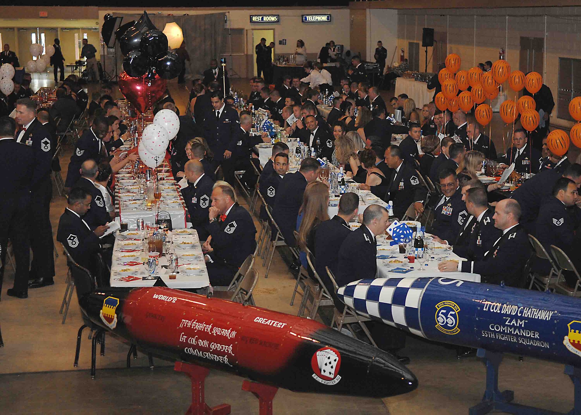 SUMTER, S.C. -- Airmen from the 20th Maintenance Group take their seats to begin the Maintenance Professional of the Year Banquet on April 13 at the Sumter Exhibition Center. The Professional of the Year banquet is held to highlight the contributions of all 20th MXG members and to recognize the most outstanding Airmen within the group. (U.S. Air Force photo/Staff Sgt. Nathan Bevier)