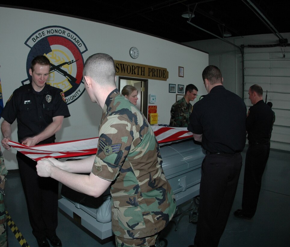 Ellsworth's honor guard wrapped up a four-day training course April 12 which officers from the Rapid City Police Department attended. The group of new honor guard members and local police officers was trained on marching, facing movements, posting the colors, funerals and firing party. It’s been nearly two years since the last joint training class was held. (U.S. Air Force photo/Airman 1st Class Kimberly Moore Limrick)