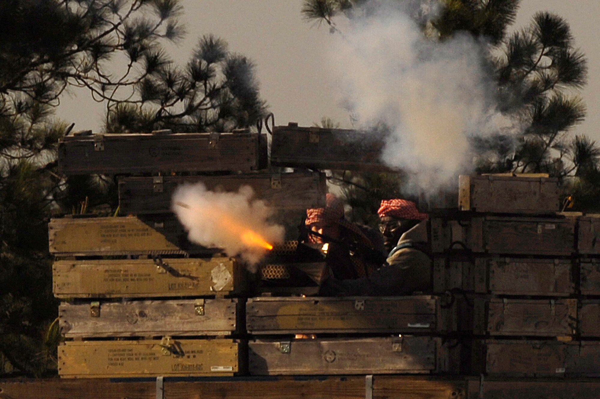 Air Force members portraying opposition forces launch simulated artillery at a convoy April 17 during Atlantic Strike 5 at Avon Park, Fla. Atlantic Strike is a joint forces training event involving joint terminal attack controllers from the Army, Air Force and Marines and is held semi-annually at the Avon Park Air Ground Training Complex. (U.S. Air Force photo/Staff Sgt. Stephen J. Otero) 
