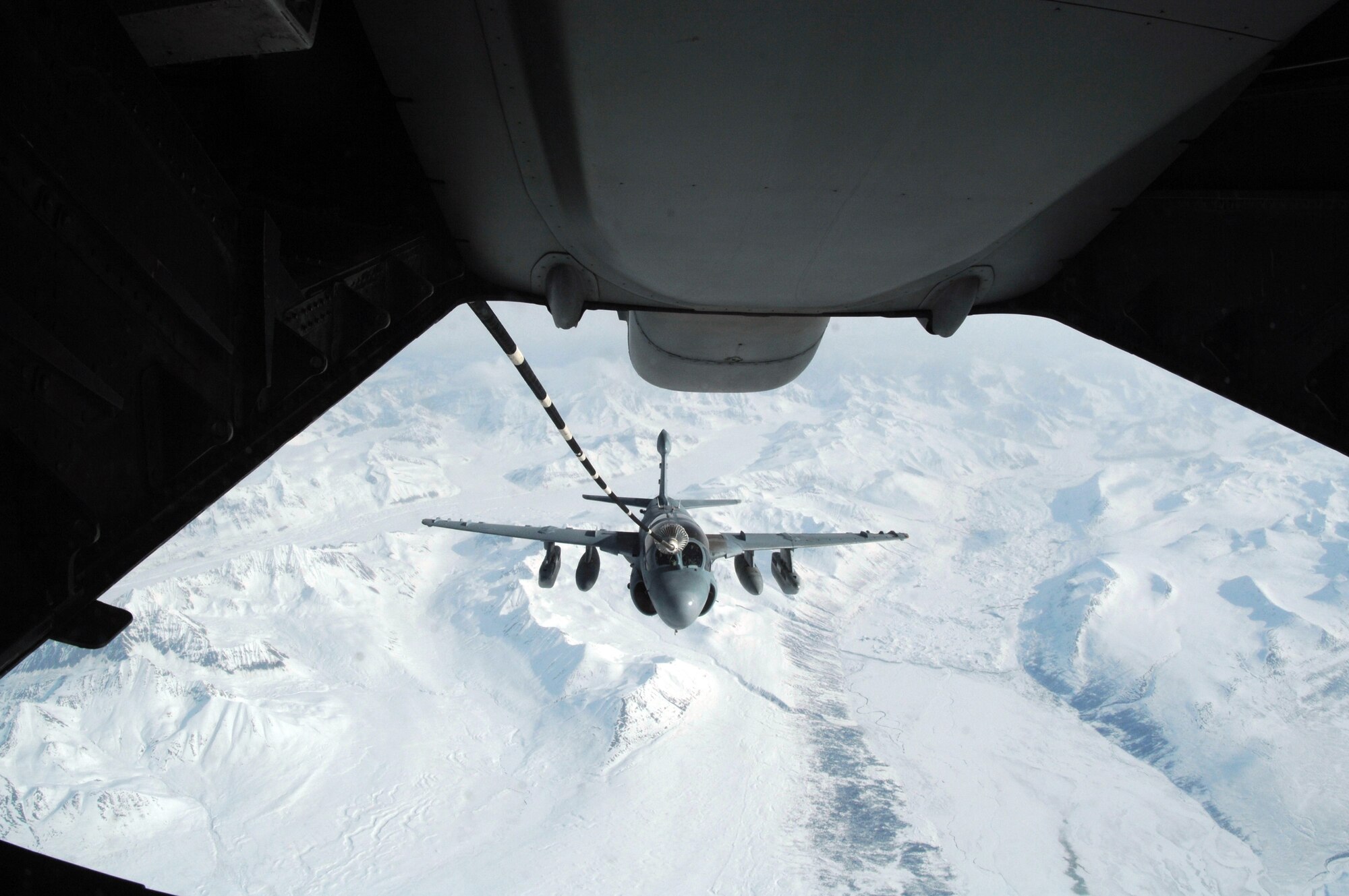 EIELSON AIR FORCE BASE, Alaska -- A Navy EA-6B from VAQ-141 Naval Air Station Whidbey Island, refuels from KC-10 Extender, call sign "Shaman Five One" during a refueling mission here on 18 April in support of Red Flag-Alaska 07-1. The KC-10 Extender is from McGuire Air Force Base, New Jersey and can refuel using both drouge and probe refueling in a single mission which makes it a very versitile refueling platform. Red Flag-Alaska is a Pacific Air Forces-directed field training exercise for U.S. forces flown under simulated air combat conditions. (U.S. Air Force photo by Staff Sgt. Joshua Strang)