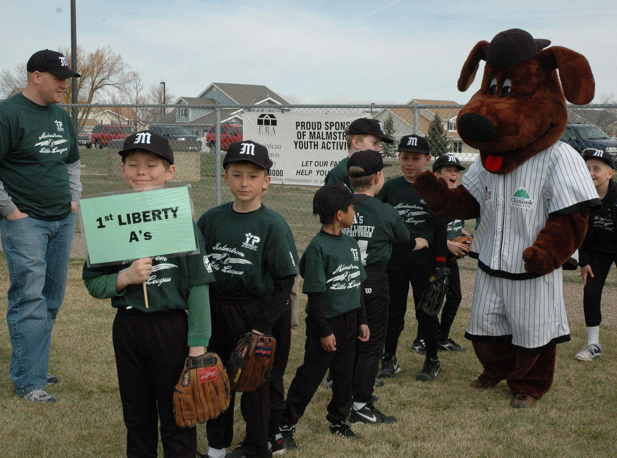 Little League members and the Great Falls White Sox mascot, Boomer, wait for activities to start at Little League opening day April 14. For more coverage, see pages 10 and 11. Photo by Airman 1st Class Emerald Ralston
