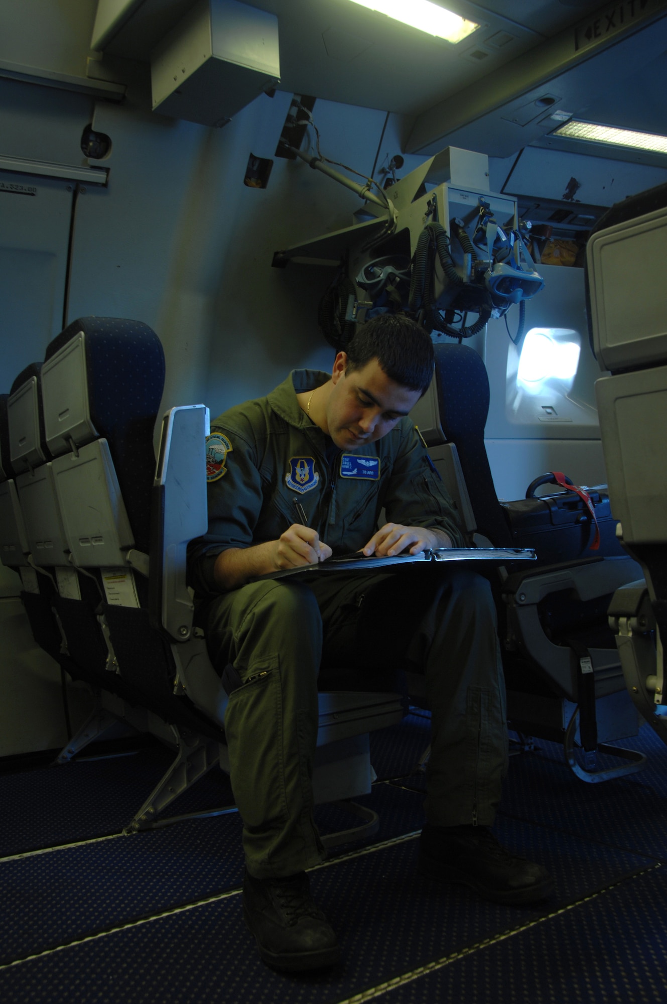 EIELSON AIR FORCE BASE, Alaska -- Staff Sgt Angel Gomez, KC-10 Boom Operator, 78th Air Refueling Squadron, McGuire Air Force Base, New Jersey performs his preflight checklist before a refueling mission here on 18 April in support of Red Flag-Alaska 07-1. Red Flag-Alaska is a Pacific Air Forces-directed field training exercise for U.S. forces flown under simulated air combat conditions. (U.S. Air Force photo by Staff Sgt. Joshua Strang)