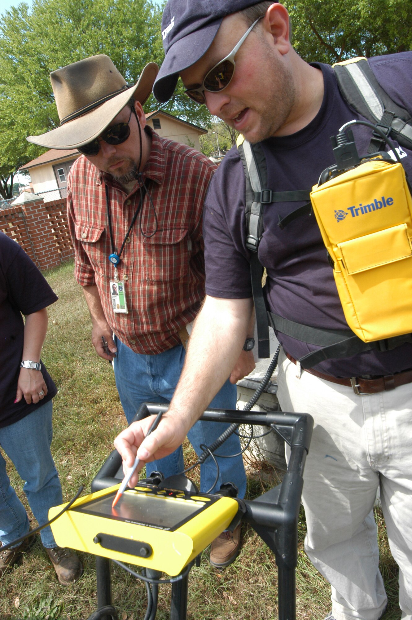 Stephen Hammack, Robins archeologist, looks on as Matthew Barner points out some anomalies that the GPR has come across.  U. S. Air Force photo by Sue Sapp
