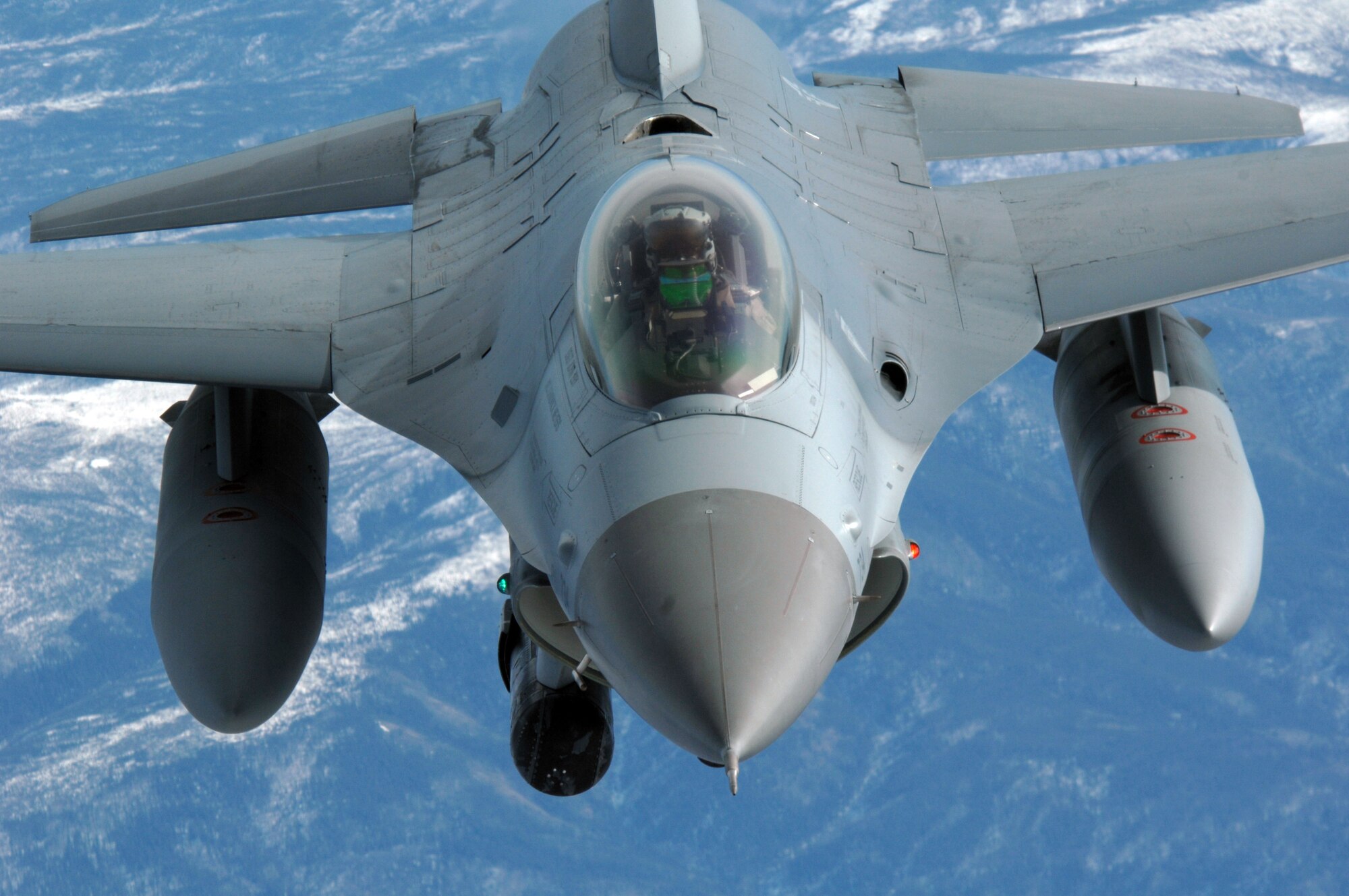 EIELSON AIR FORCE BASE, Alaska -- An F-16C, 18th Fighter Squadron "Blue Foxes", Eielson Air Force Base, Alaska, pulls in to refuel during a mission here on 18 April in support of Red Flag-Alaska 07-1. The 18th Fighter Squadron conducts air operations for combat-ready F-16 aircraft, working closely with 355th Fighter Squadron to provide close air support, forward air control (airborne), battlefield air interdiction, and offensive counter air. Red Flag-Alaska is a Pacific Air Forces-directed field training exercise for U.S. forces flown under simulated air combat conditions. (U.S. Air Force photo by Staff Sgt. Joshua Strang)