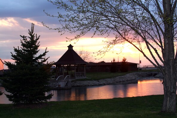 GRISSOM AIR RESERVE BASE, Ind., -- The sun acts as a backdrop silhouetting the gazebo near the civil engineering pond and the budding trees at the base. Grissom has won numerous environmental awards making each Earth Day better for everyone. (Air Force photo/SrA. Omar Delacruz)