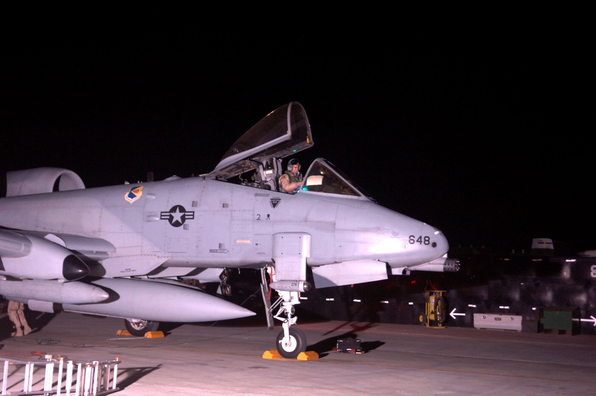 An A-10 Thunderbolt pilot prepares to exit the aircraft after landing at Bagram Air Base, Afghanistan, April 17. The A-10s are deployed to the 354th Expeditionary Fighter Squadron from Davis-Monthan Air Force Base, Ariz. (U.S. Air Force photo/Staff Sgt. Kevin Tomko) 