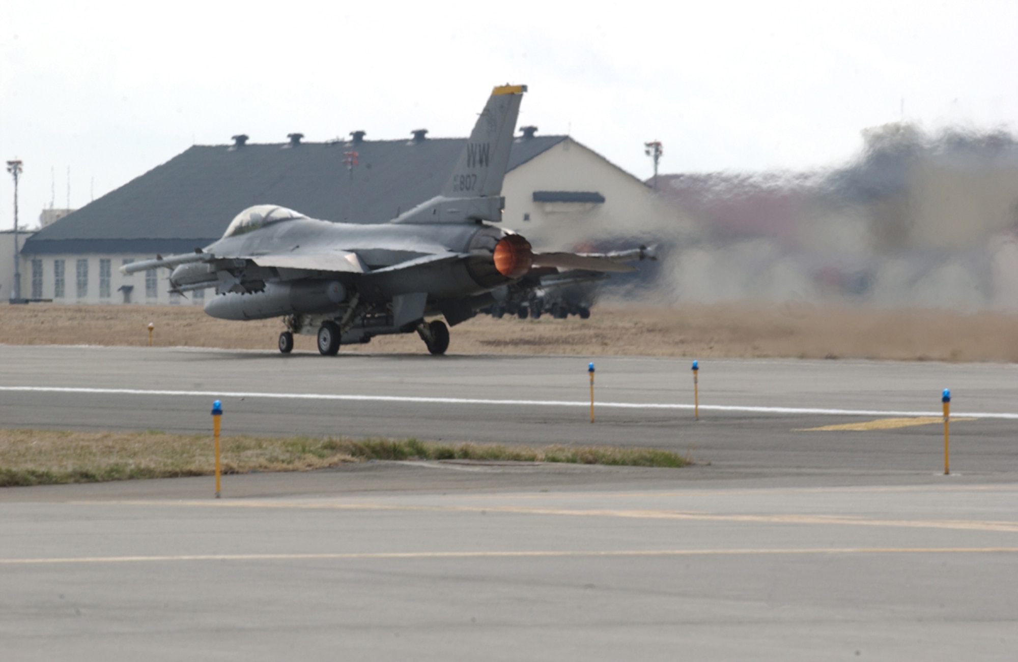 070413--MISAWA AIR BASE, Japan --A Misawa Wild Weasel F-16 pilot takes off here. The 13th Fighter Squadron is making final preparations for their Air Expeditionary Force deployment to Iraq this summer. The squadron will replace the 14th Fighter Squadron currently conducting combat operations in Iraq.  (U.S. Air Force photo by Senior Airman Robert Barnett)