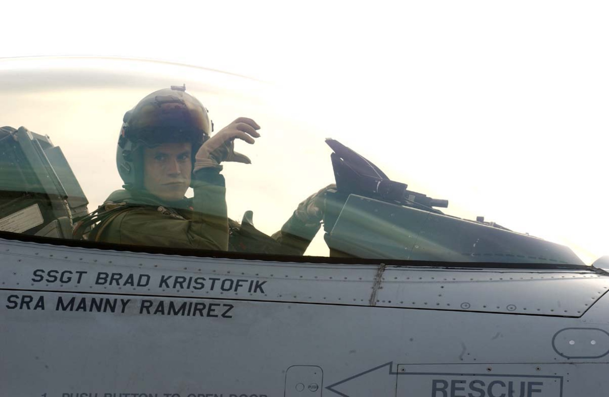 070413--MISAWA AIR BASE, Japan --Capt. Kevin Hicok, 13th Fighter Squadron pilot, gives the panther "claw" sign before launching on an F-16 Close Air Support training mission here. The 13th Fighter Squadron is making final preparations for their Air Expeditionary Force deployment to Iraq this summer. The squadron will replace the 14th Fighter Squadron currently conducting combat operations in Iraq.  (U.S. Air Force photo by Senior Airman Robert Barnett)