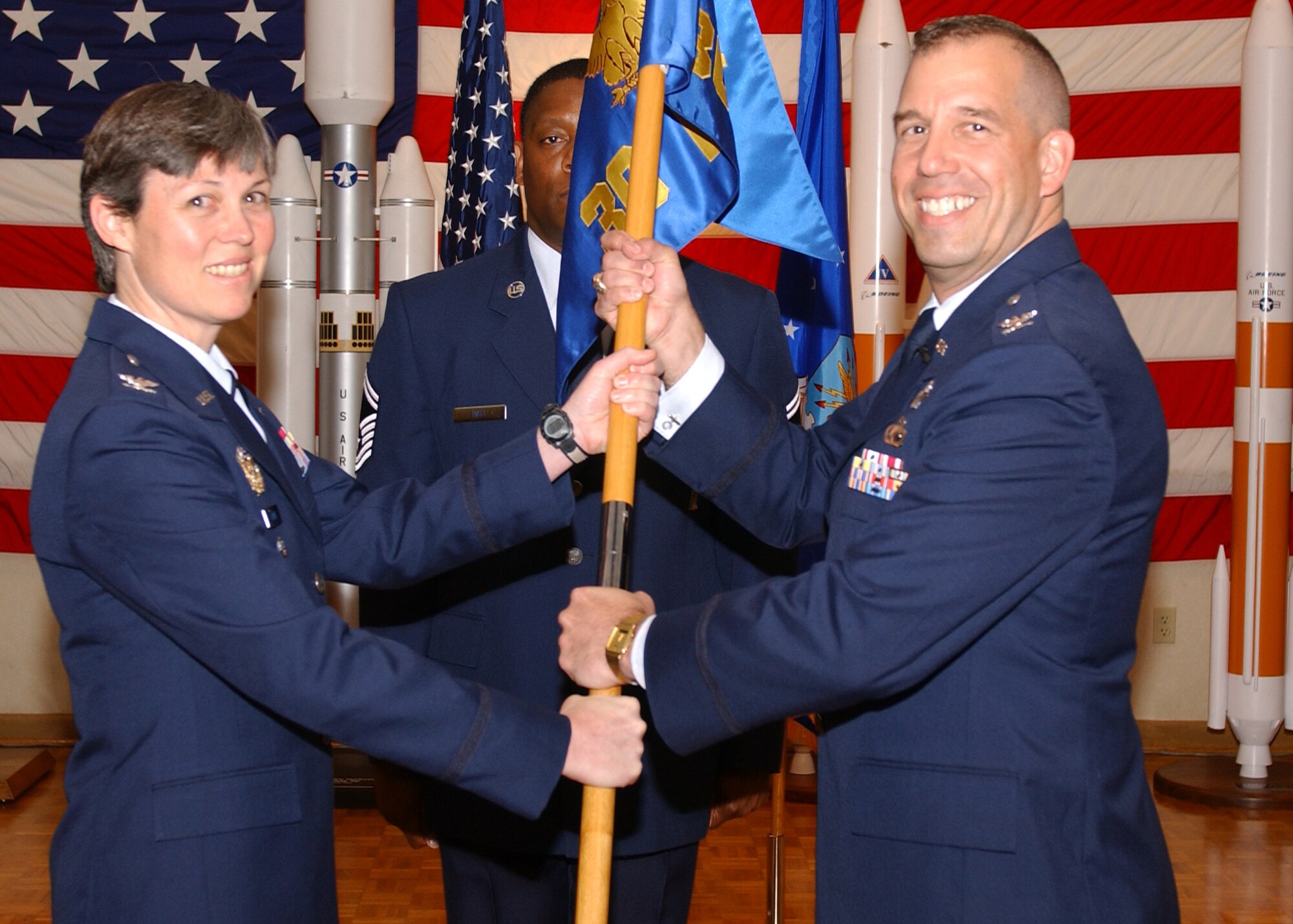 Col. Carl Frushon assumes command of the 30th Launch Group from Col. Col. Teresa Djuric, 30th Space Wing vice commander at the Pacific Coast Club April 20. Colonel Frushon is coming from Royal Air Force Menwith Hill, United Kingdon, as the director of the Systems Engineering Group.  He was also at Vandenberg as a Titan IV Launch Manager with the 4th Space Launch Squadron from September 1993 to September 1994.  Colonel Frushon is prepared to take on the duties of the 30th Launch Group and continue the display of excellence at Vandenberg.